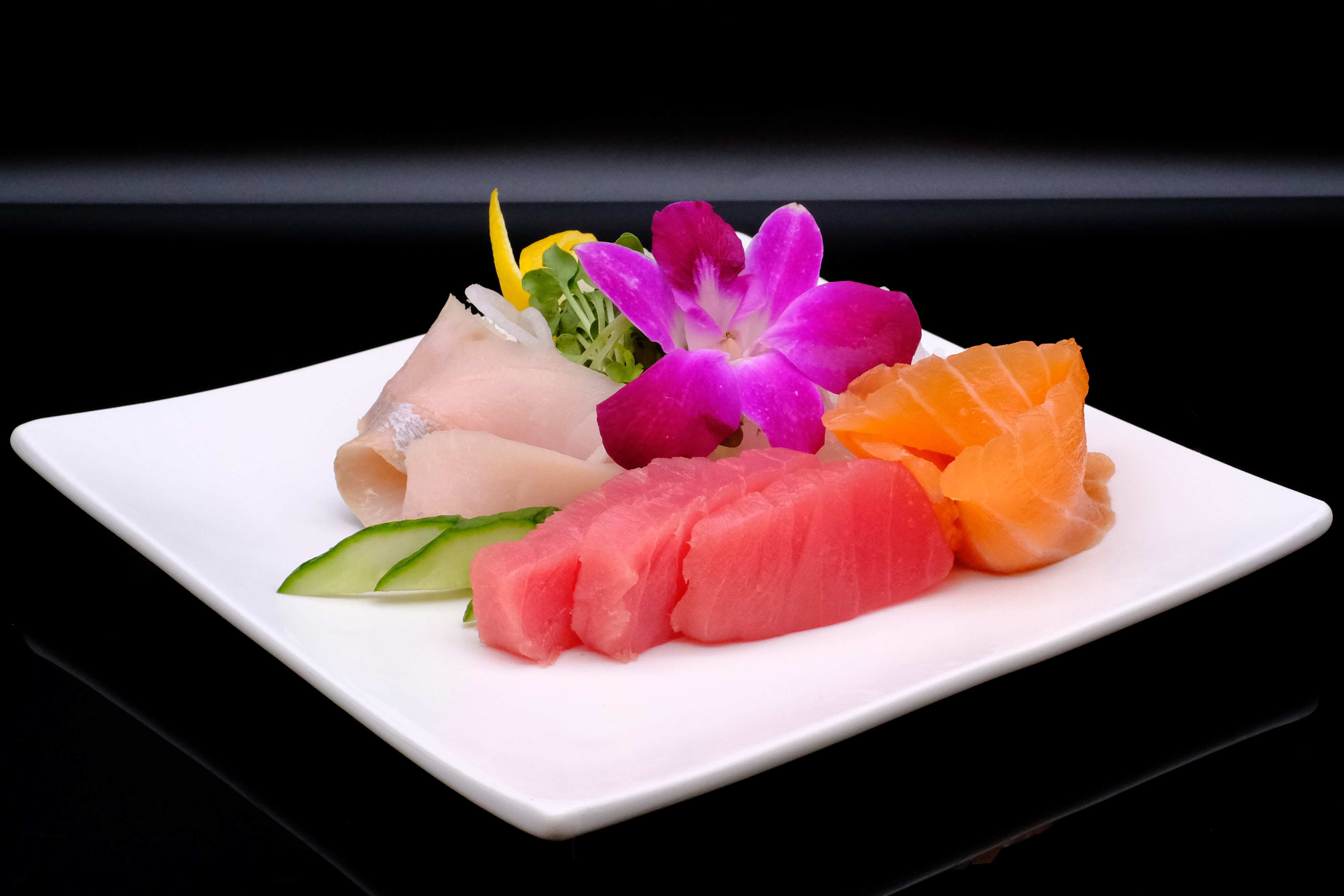 Order 9 Piece Sashimi  food online from Banzai Japanese Bar & Kitchen store, Fresno on bringmethat.com