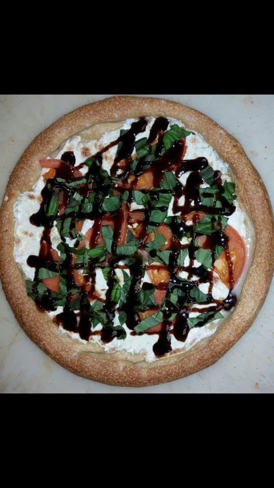 Order Caprese Pizza food online from Minervas Pizza store, Providence on bringmethat.com