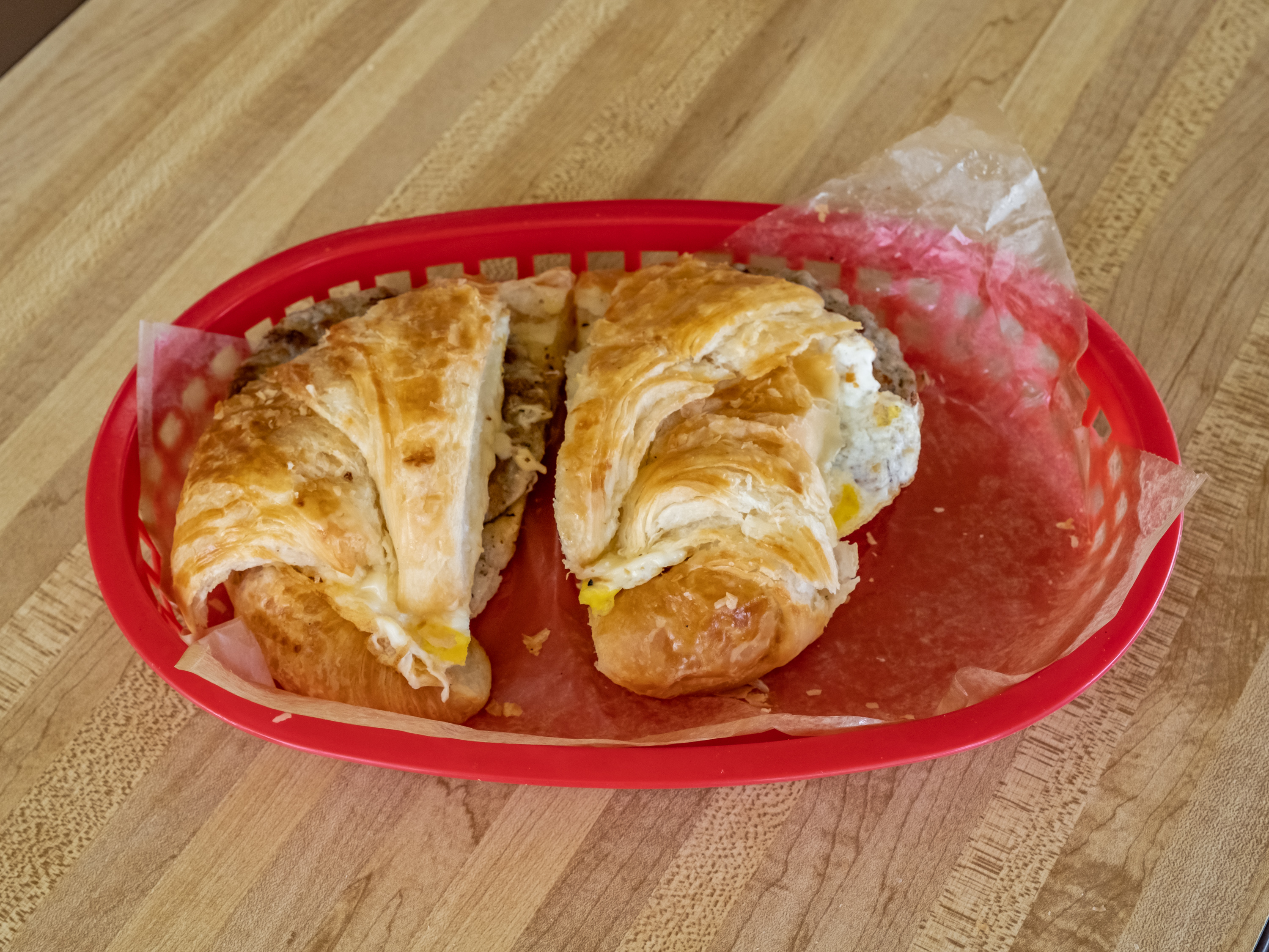 Order #12. Sausage, Egg and cheese. Croissant 縷 food online from Donut Plus store, Orange on bringmethat.com