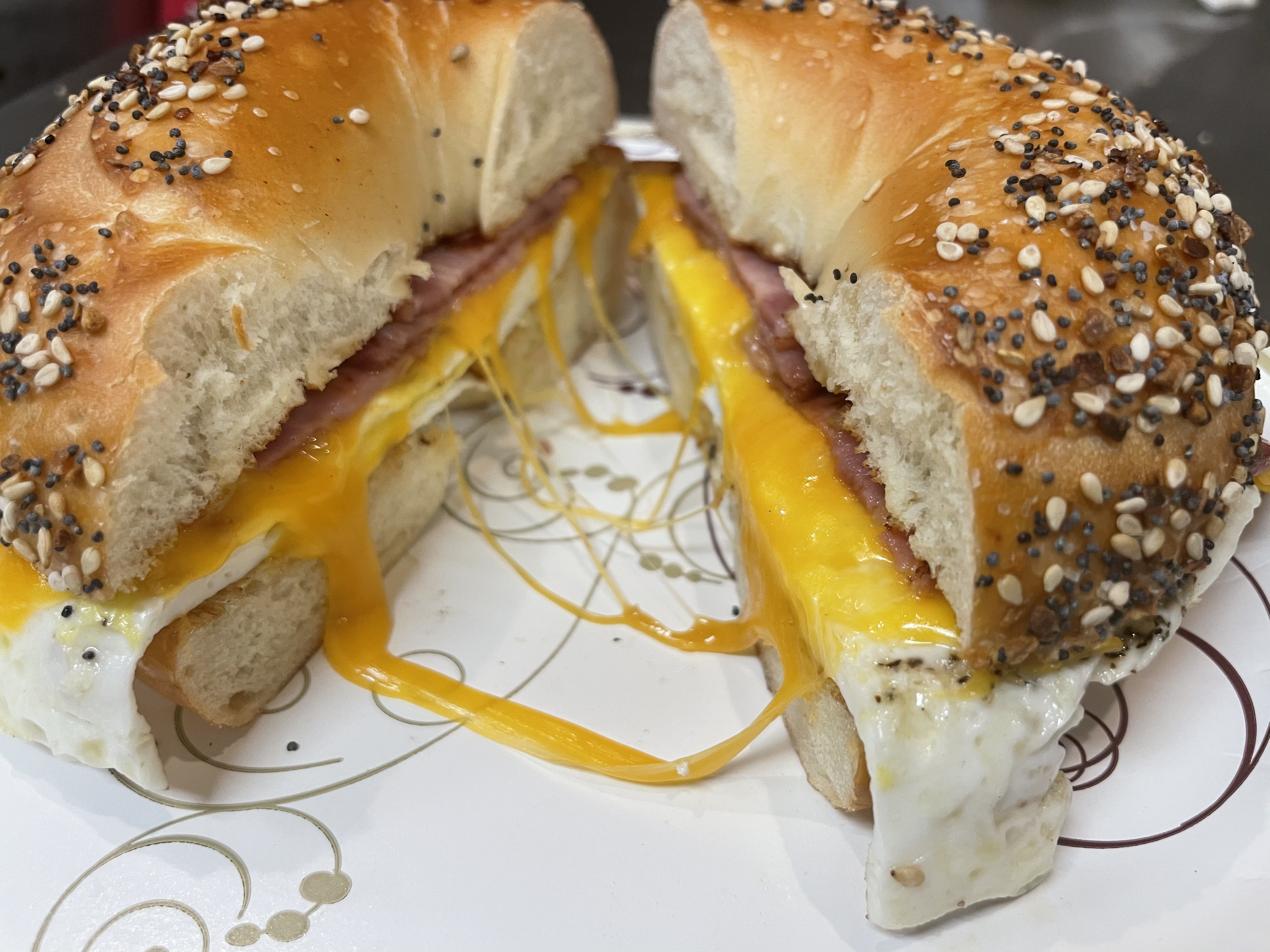 Order Egg, Meat and Cheese Sandwich food online from Yardley Bagel Cafe store, Yardley on bringmethat.com