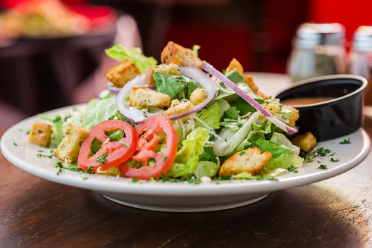 Order Simple House Salad (Big) food online from Oregano's Pizza Bistro store, Tempe on bringmethat.com