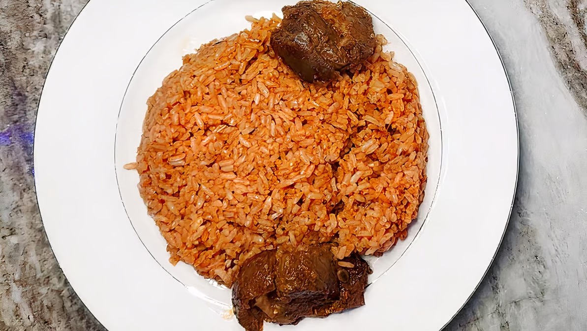 Order Jollof rice with Goat meat food online from Prime Restaurant store, Hyattsville on bringmethat.com