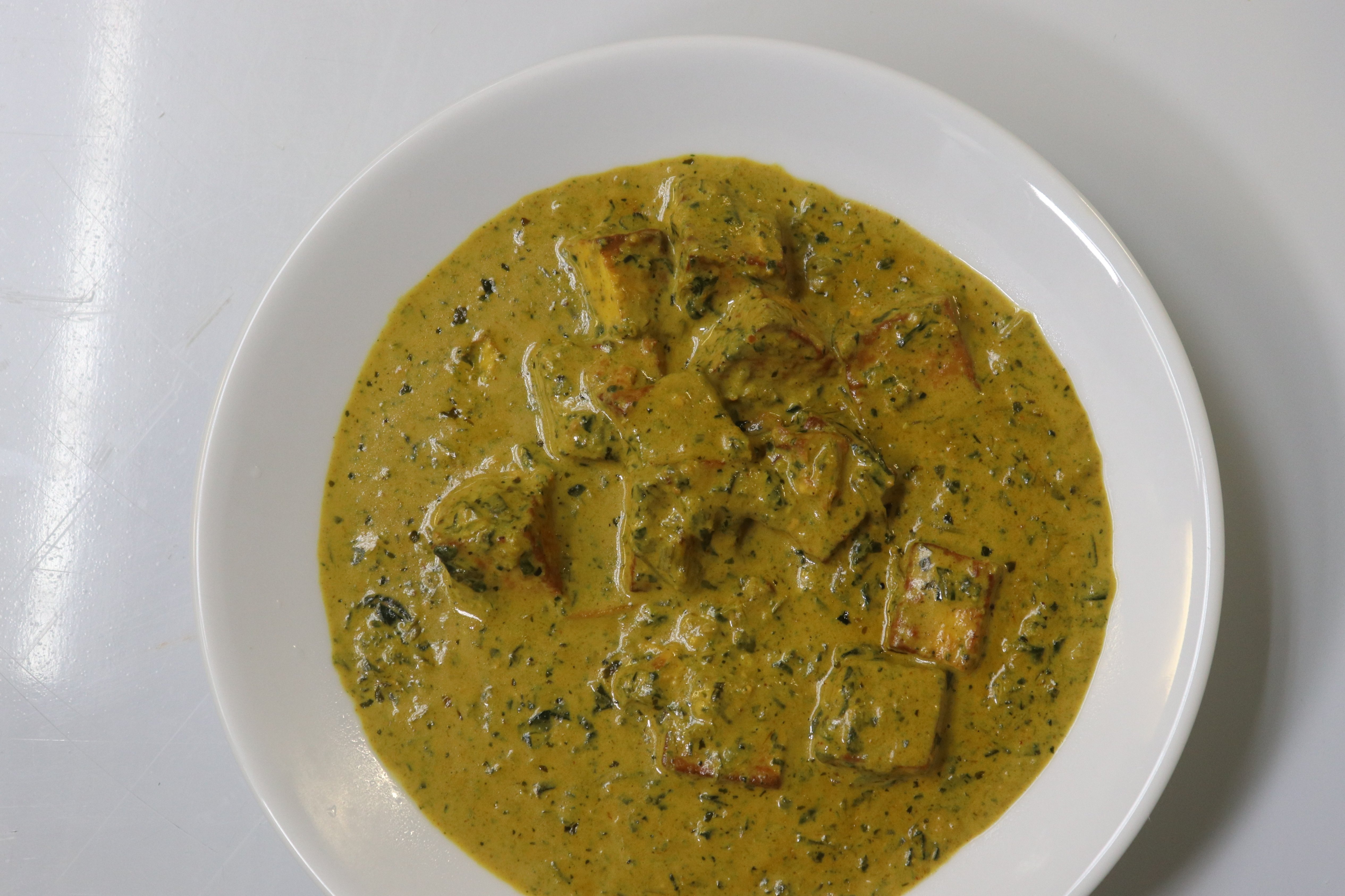 Order Palak Chicken food online from Hot N Spicy Restaurant store, Irving on bringmethat.com
