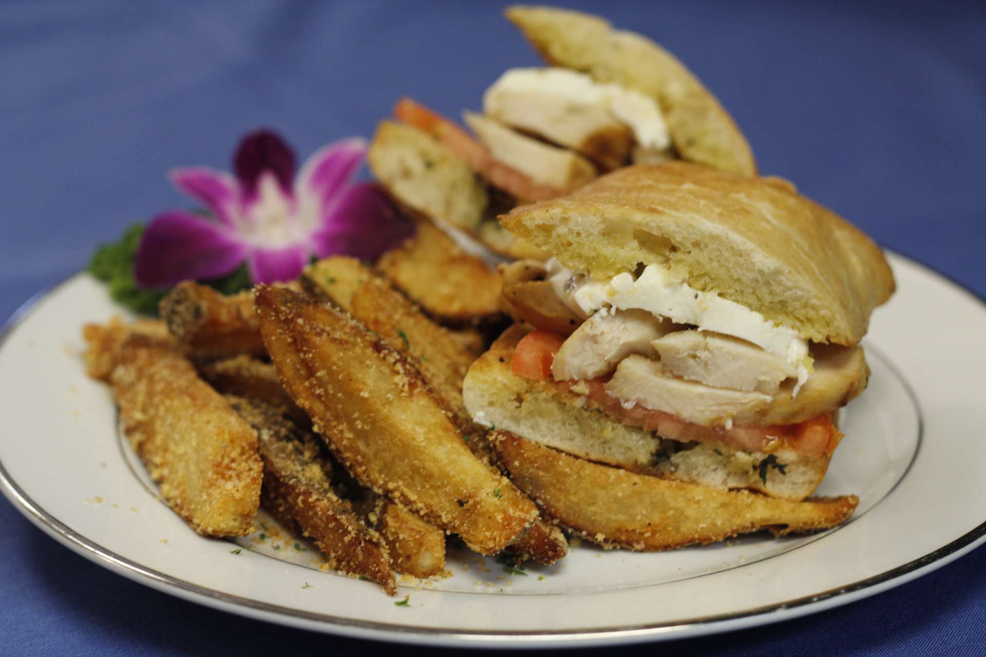 Order Grilled Chicken Pesto Panini food online from Celebrations Comfort Kitchen store, Manchester on bringmethat.com