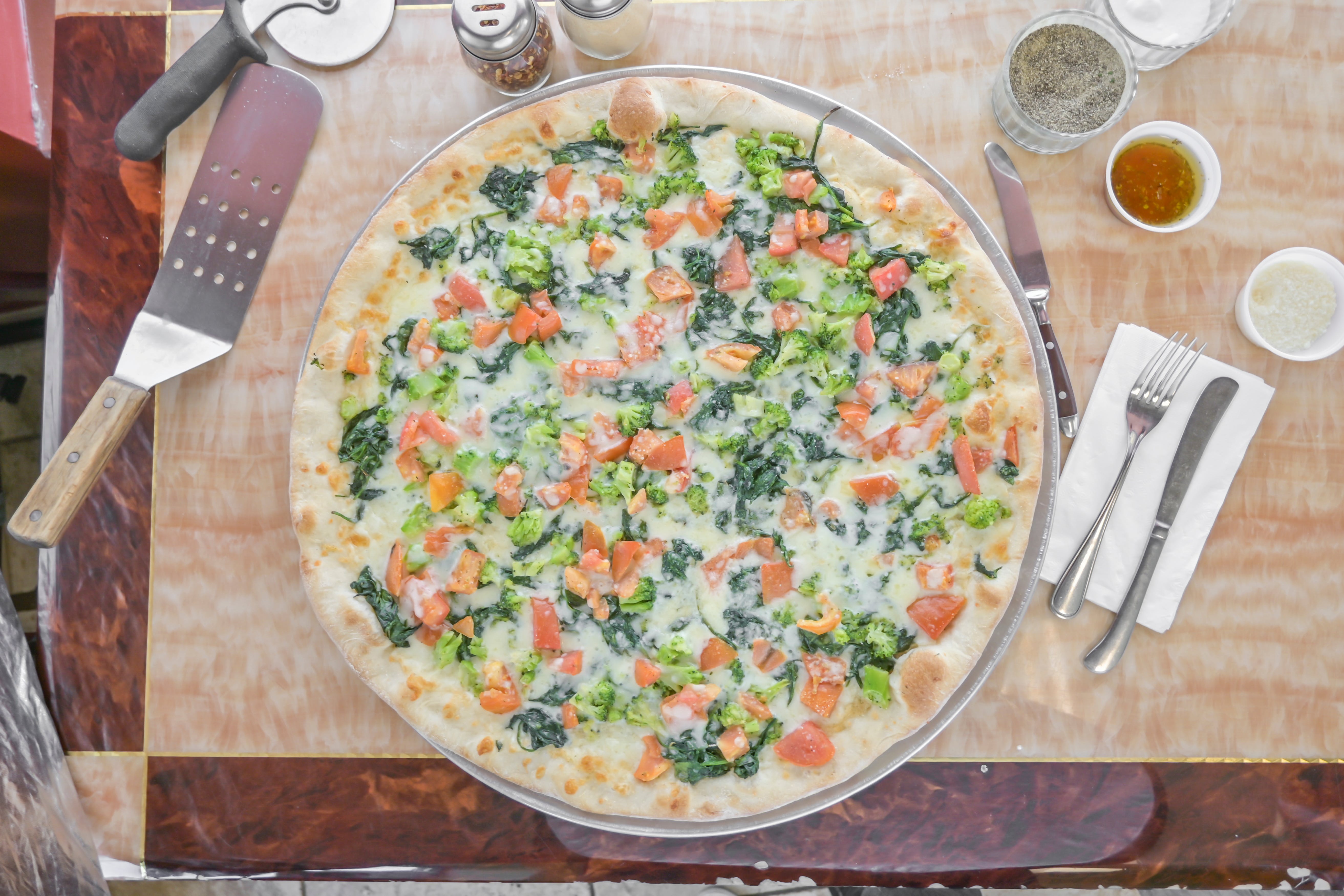 Order Veggie White Pizza - Small 12" food online from Tuscan Pizza store, Sicklerville on bringmethat.com