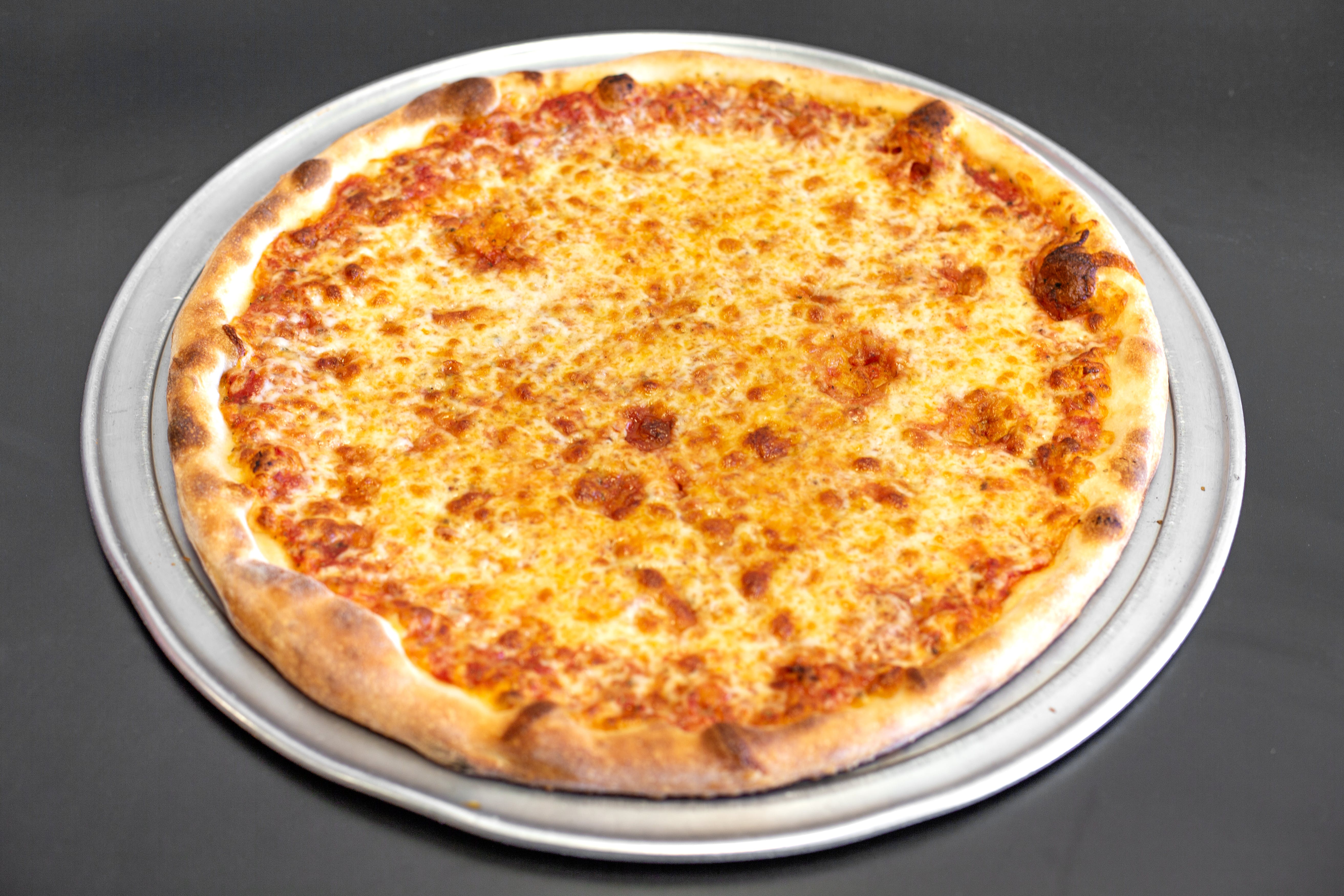 Order New York Style Cheese Pizza - Pizza food online from Gerardo's Pizza & Pasta store, Shirley on bringmethat.com