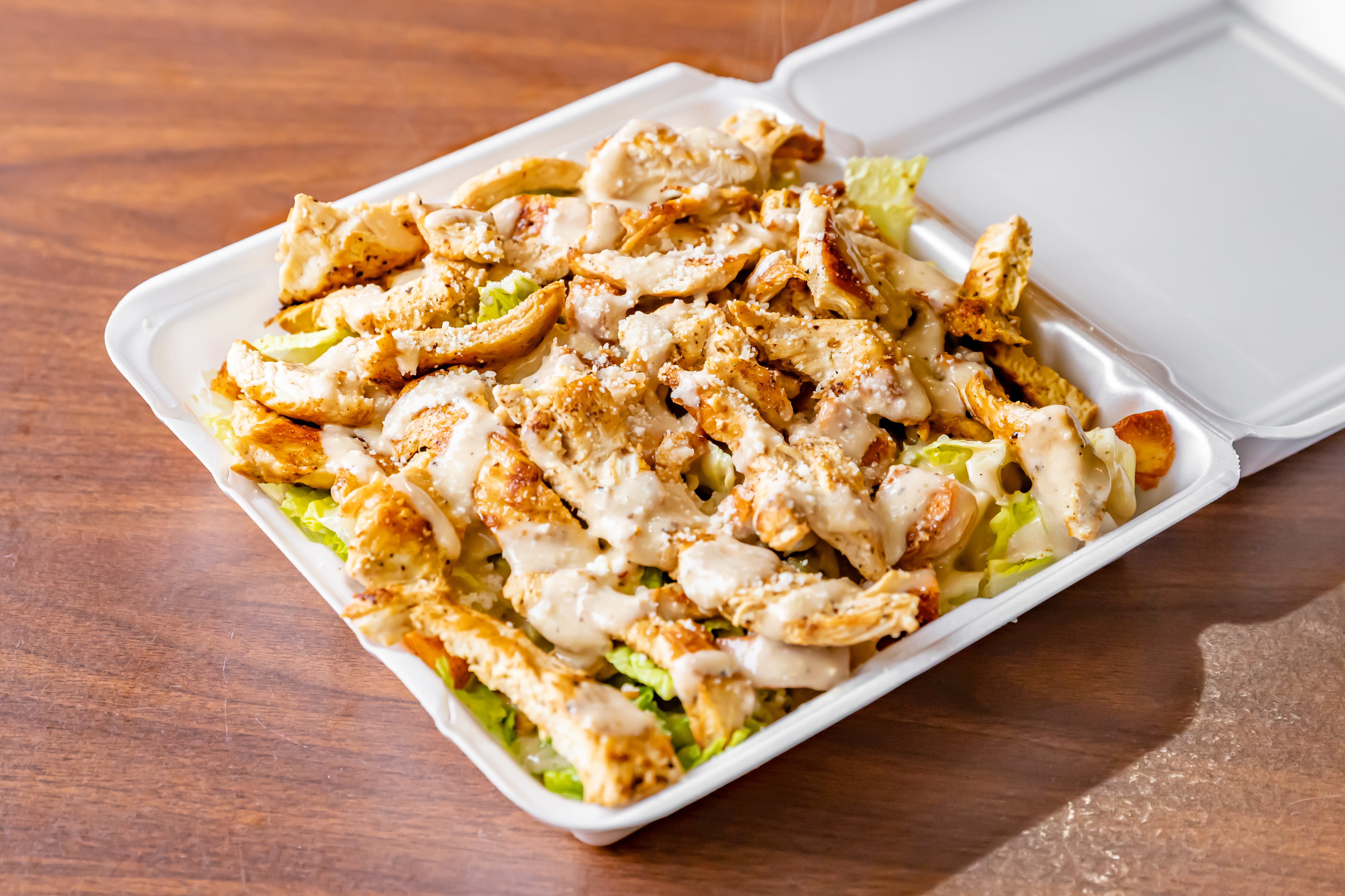Order Grilled Chicken Caesar Salad - Salad food online from Jack Pizzeria store, Phillipsburg on bringmethat.com