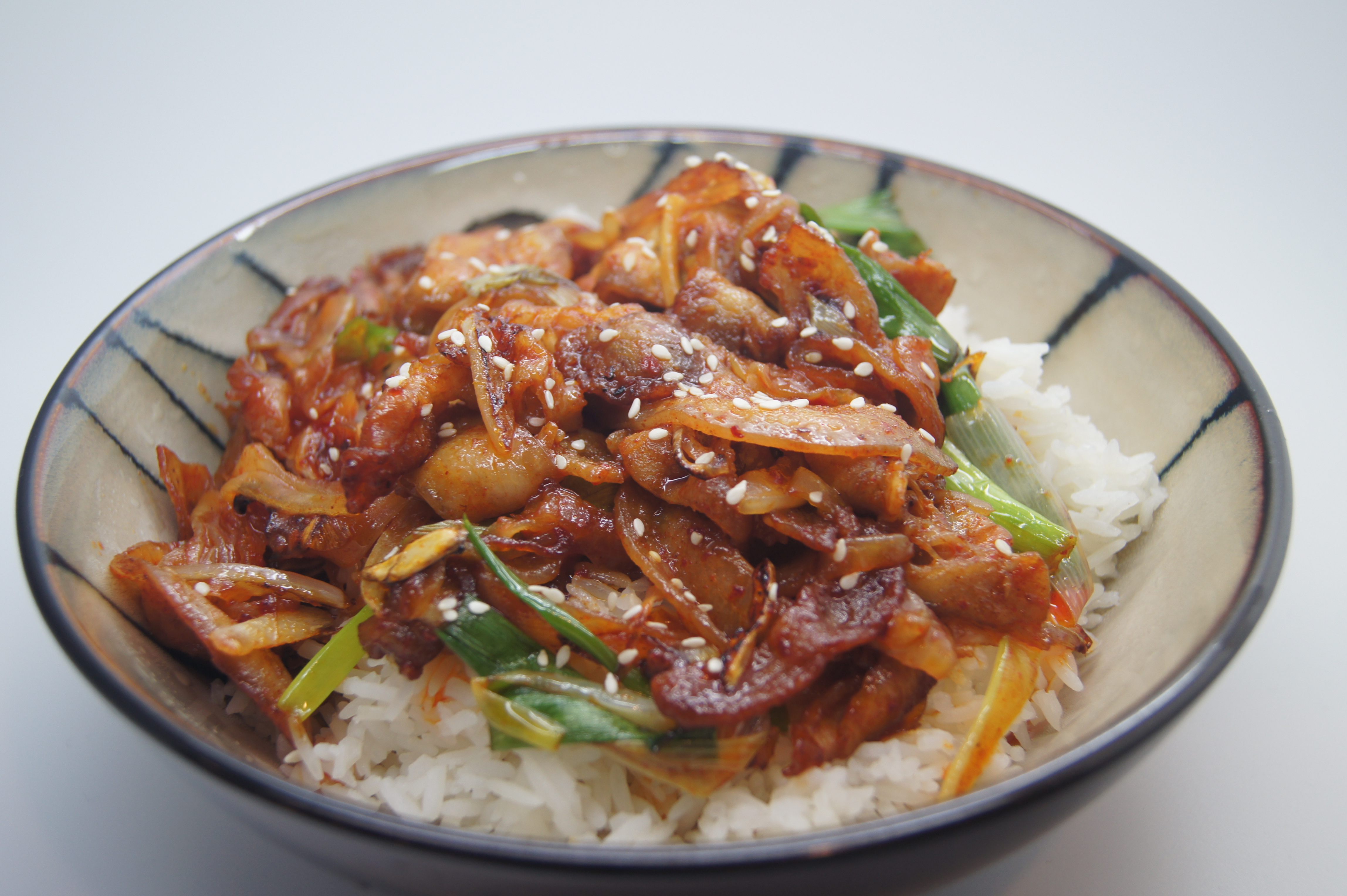 Order F03. Korean Style Spicy Pork 韓式辣五花 food online from Uncle Chen Primetime store, State College on bringmethat.com