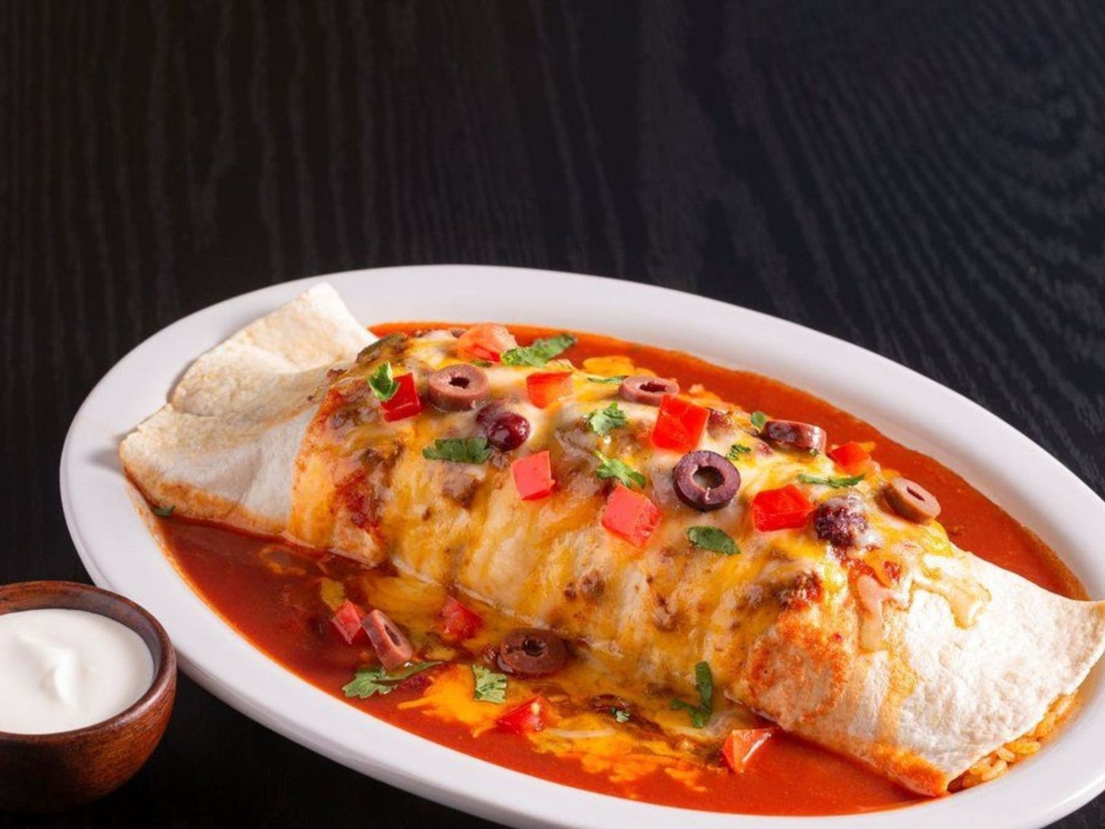 Order Outrageous Burrito ~ food online from El Fresco Mexican Grill store, Centreville on bringmethat.com