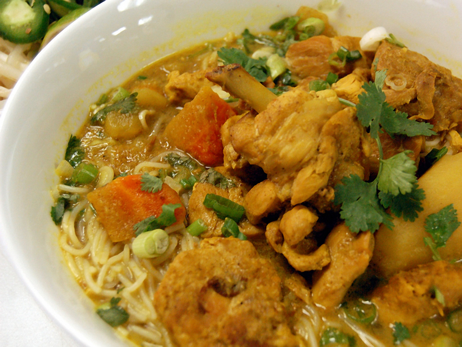 Order Curry Chicken Rice Noodles food online from Nam cafe store, New York on bringmethat.com