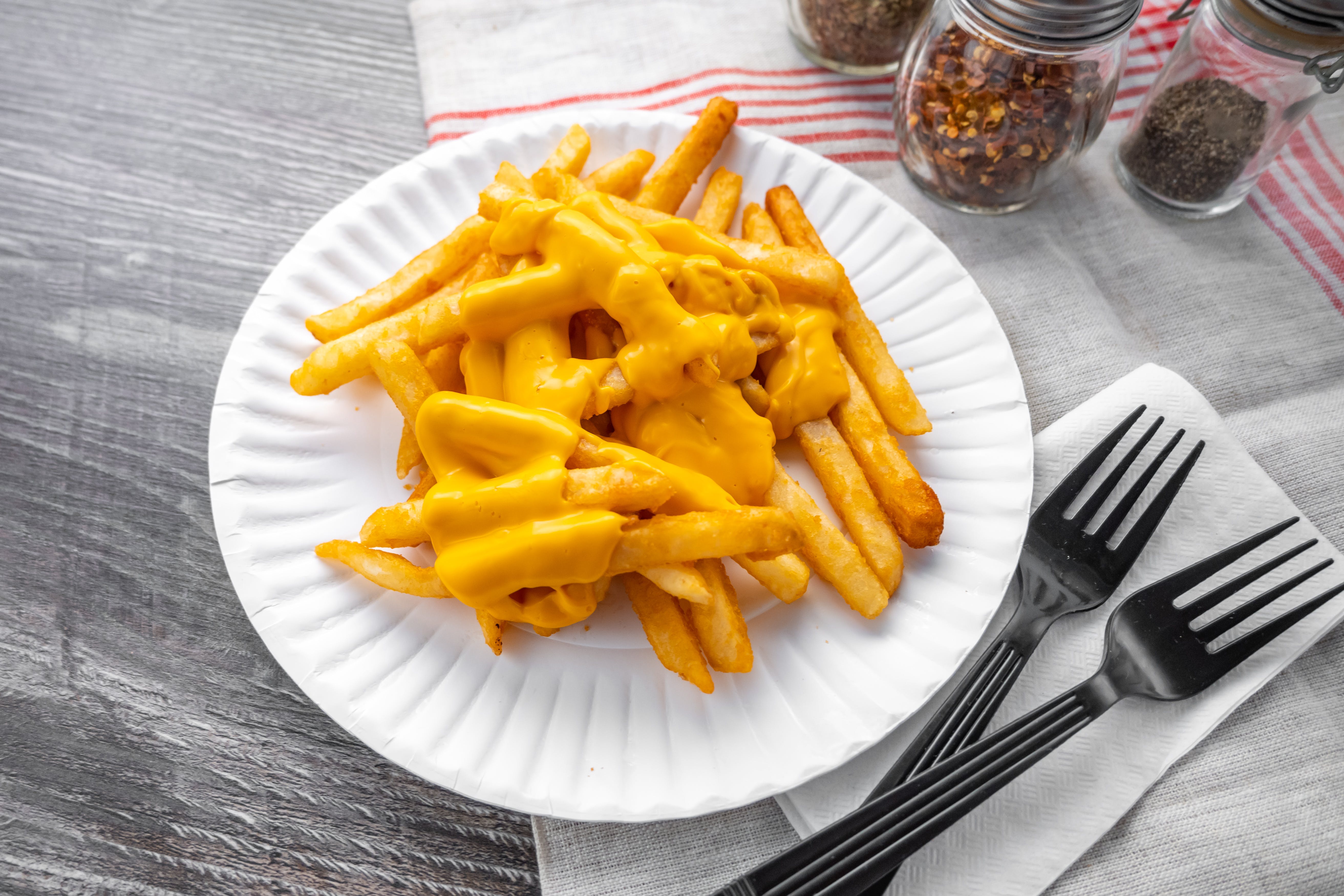 Order Cheese Fries - Fries food online from Firepit Pizzeria & Grill store, Springfield on bringmethat.com