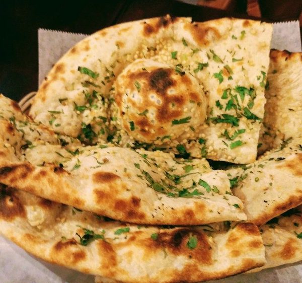 Order Garlic butter Naan food online from Himalayan Yak & Yeti store, San Diego on bringmethat.com