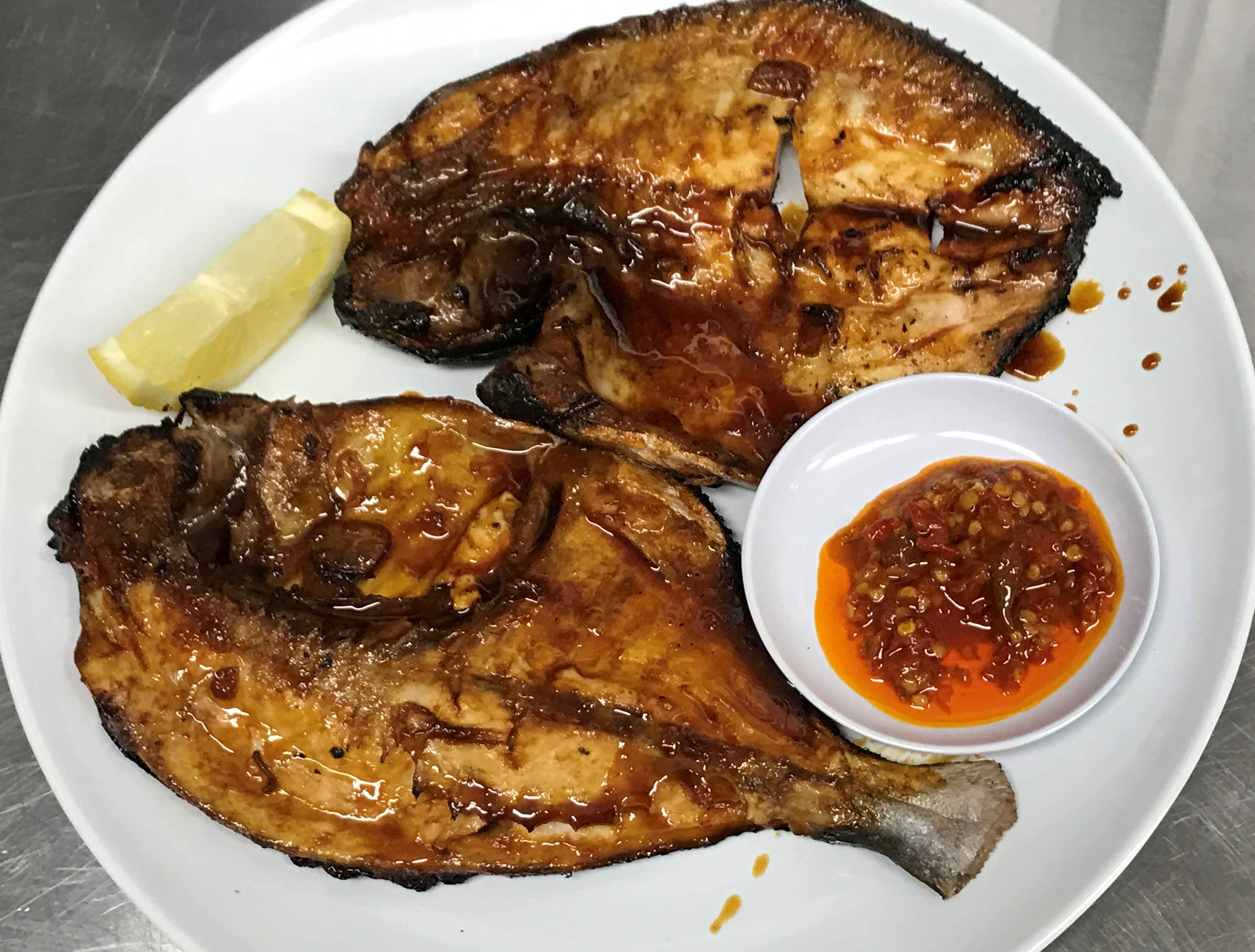 Order Grilled Pompano Honey Sauce (AL) / Grilled Pompano Honey Sauce food online from Awang Kitchen store, Elmhurst on bringmethat.com