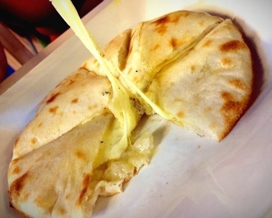 Order Cheese Naan food online from Incredible India Cafe store, Los Angeles on bringmethat.com