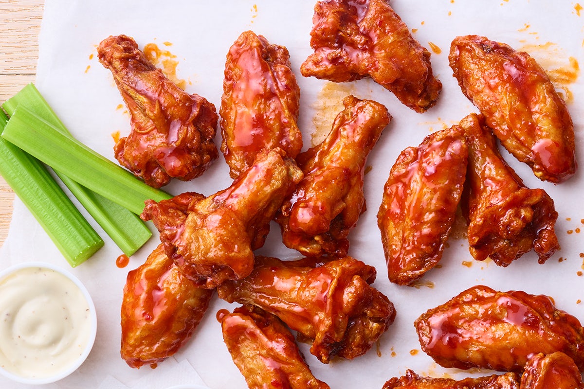 Order Traditional Wings food online from Cosmic Wings store, Grand Rapids on bringmethat.com