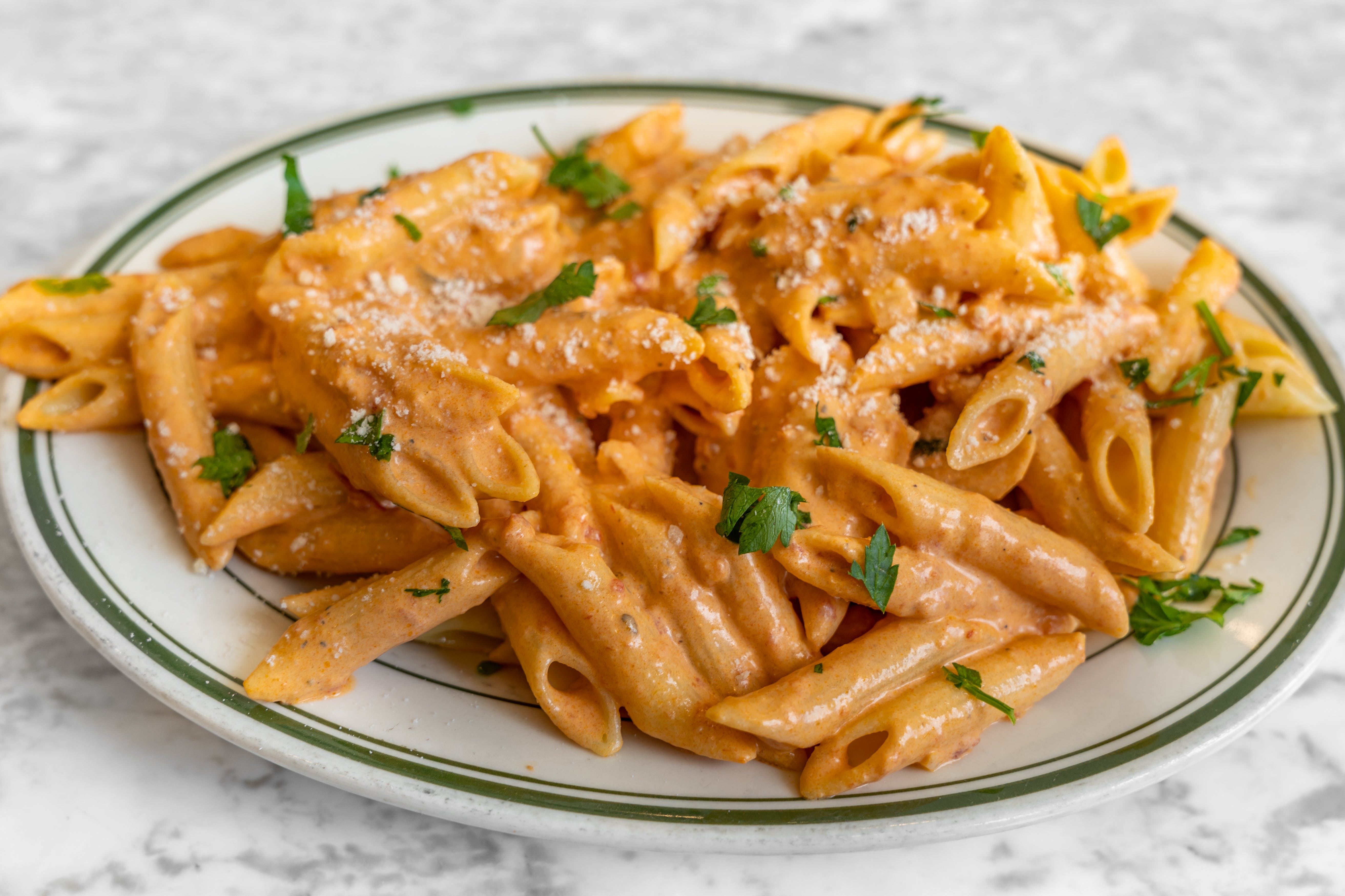 Order Penne ala Vodka - Pasta food online from Roma's pizza store, New York on bringmethat.com