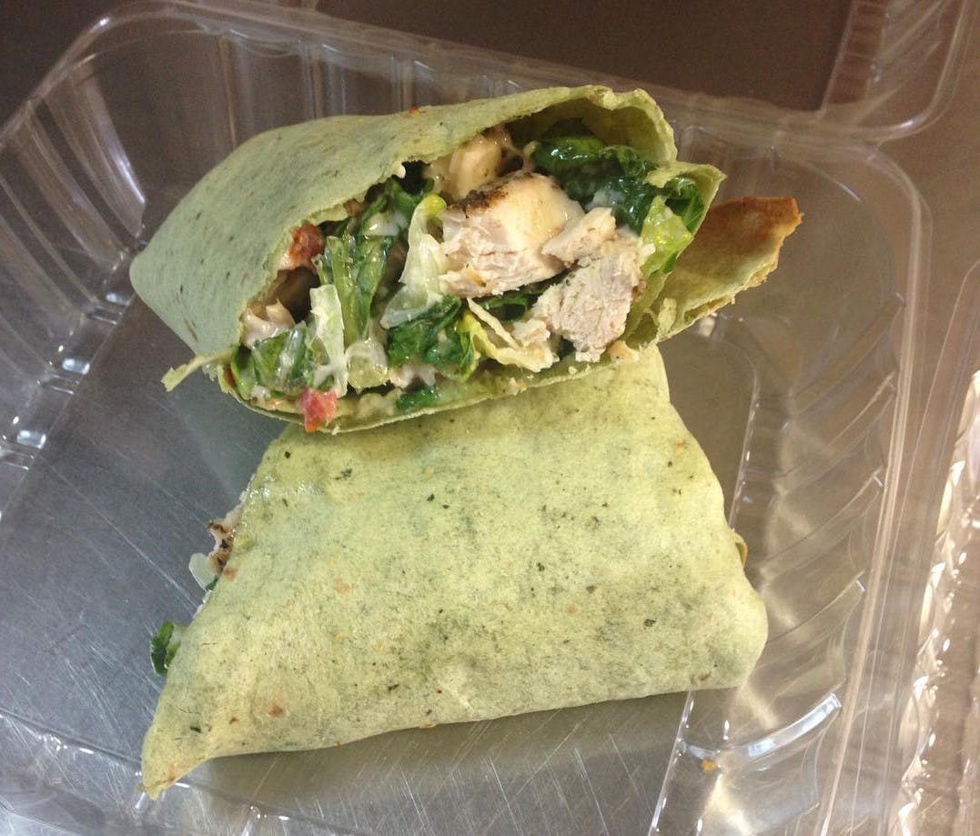 Order Chicken Caesar Salad Wrap - Wrap food online from Manhattan Chicago Pizza Kendall store, Miami on bringmethat.com