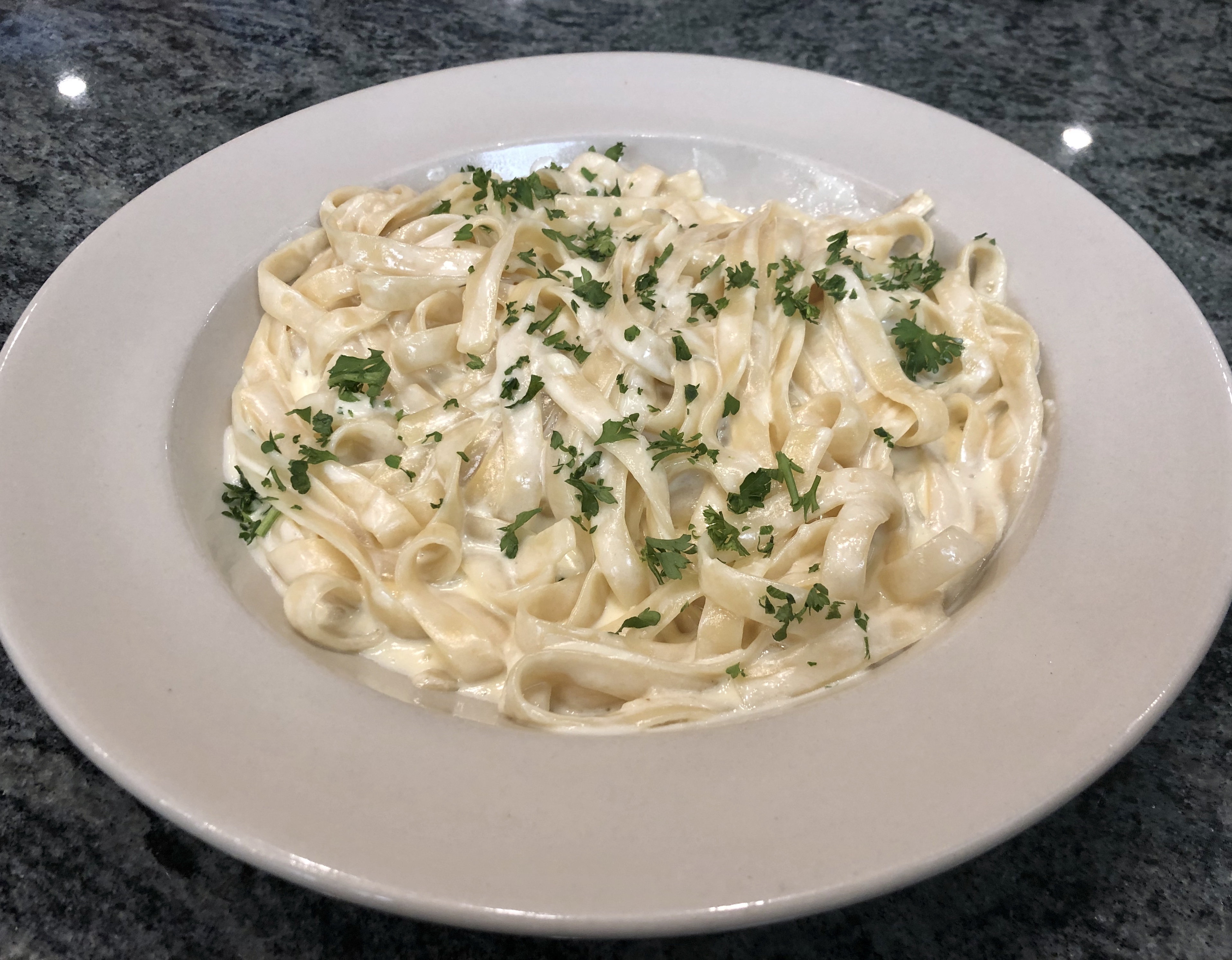 Order Fettuccine Alfredo food online from Mario's Pizzeria store, Oyster Bay on bringmethat.com