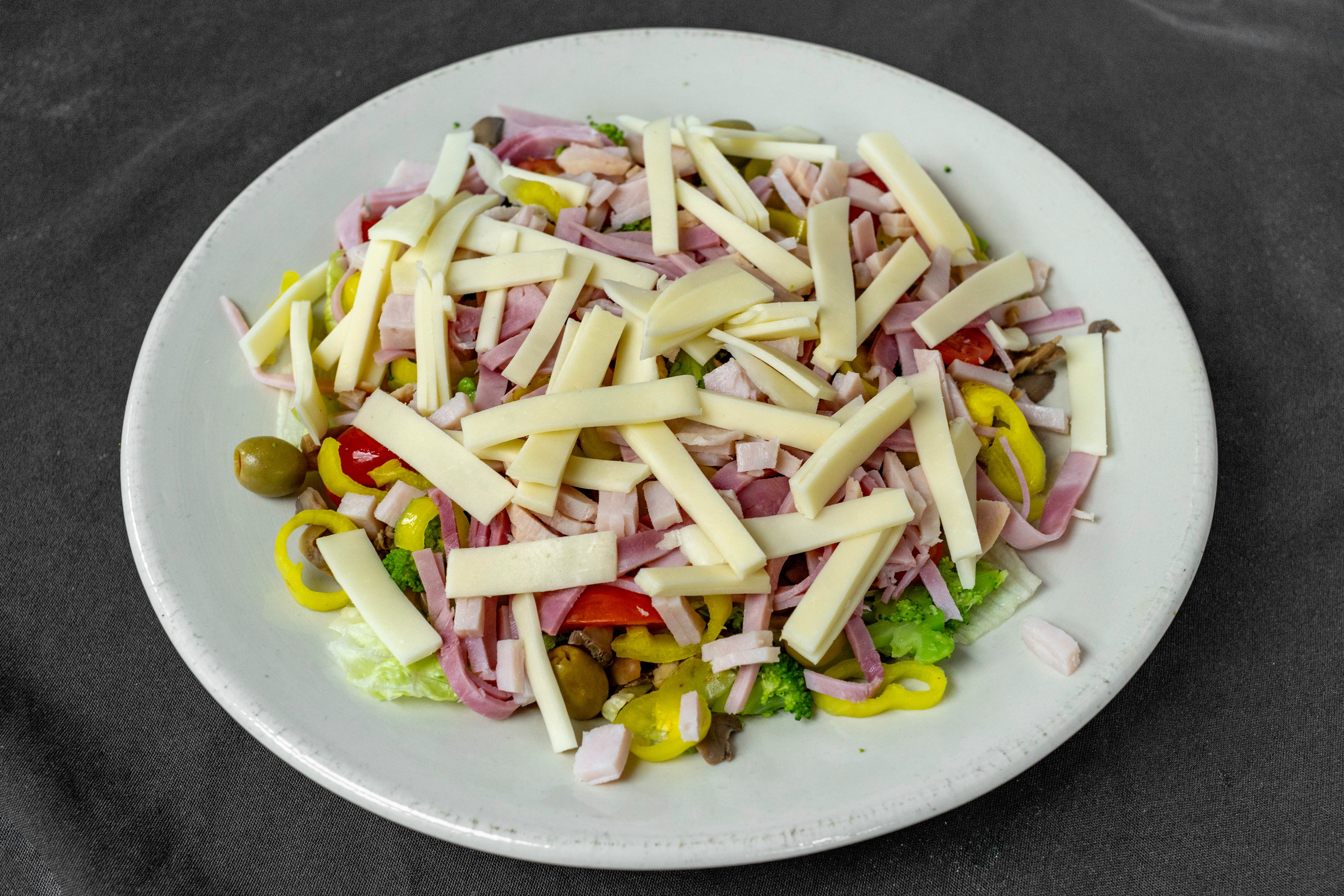 Order Greek Salad - Salads food online from Elizabeth's Pizza Walkertown store, Walkertown on bringmethat.com