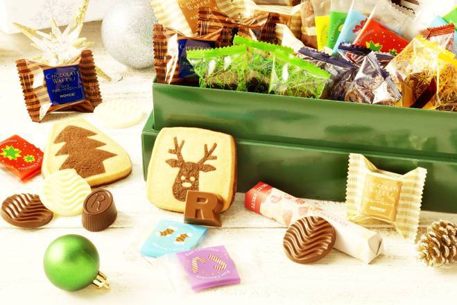 Order ROYCE' Christmas Selection "Blue" (53 Pcs) food online from Royce' Chocolate store, Irvine on bringmethat.com