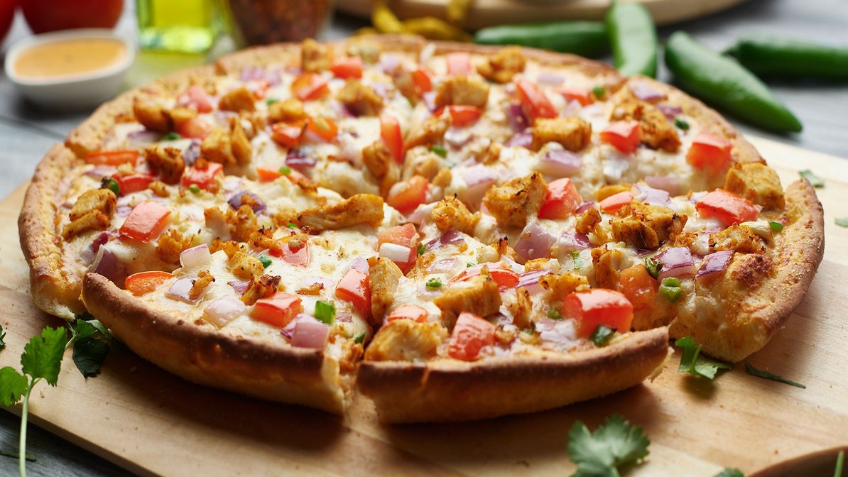 Order Butter Chicken Pizza Twist food online from Chicago's Pizza With A Twist store, Arlington on bringmethat.com