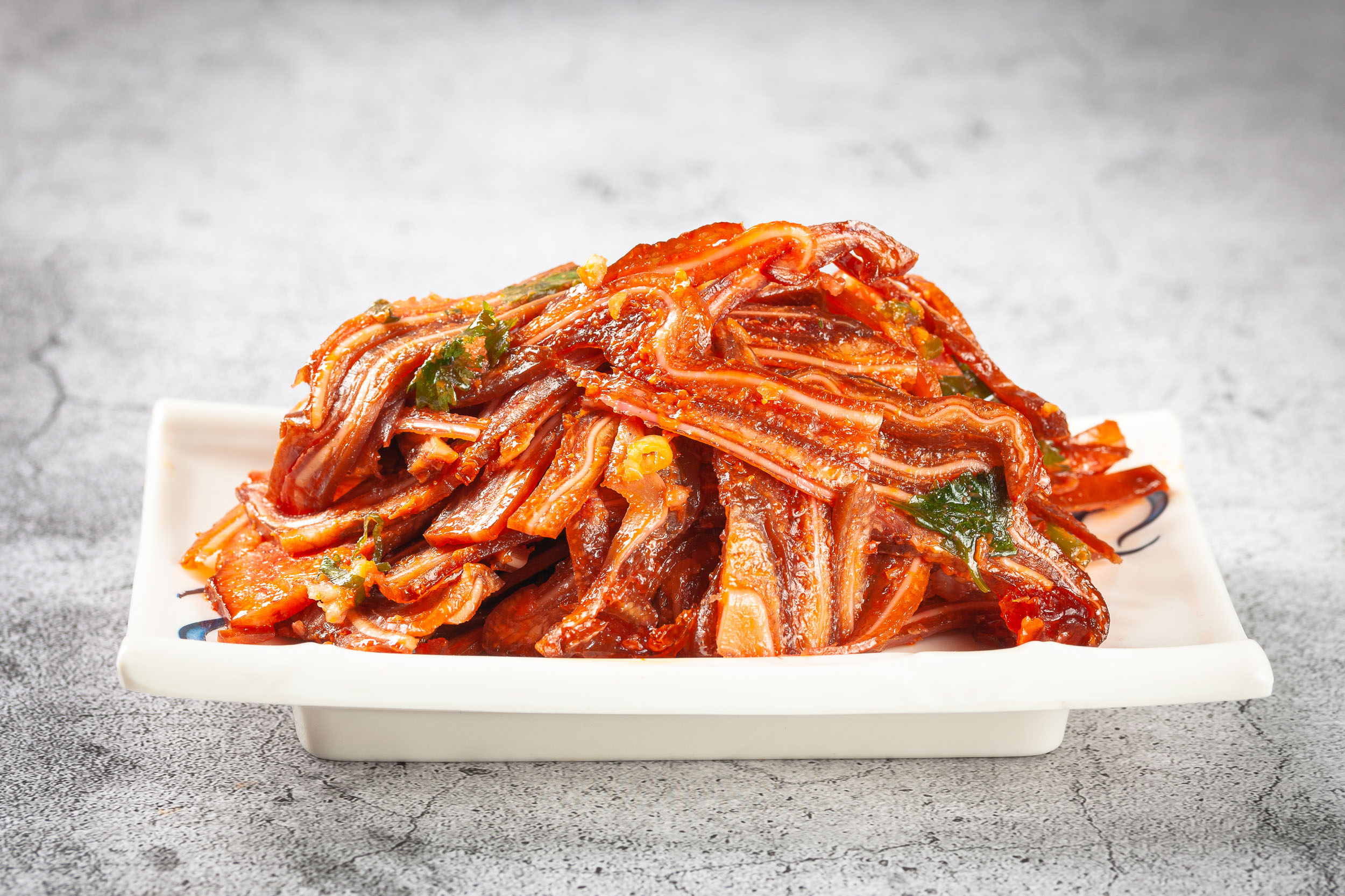 Order A1. Spicy Mixed Pig Ears food online from Mama's Dough store, Kent on bringmethat.com