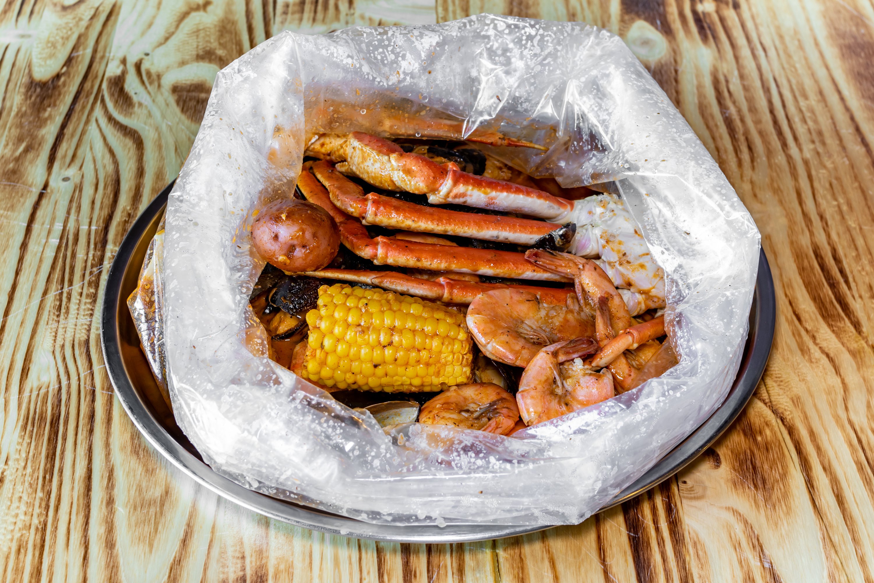 Order The Perfect Storm food online from Hook & Reel Cajun Seafood store, Dayton on bringmethat.com