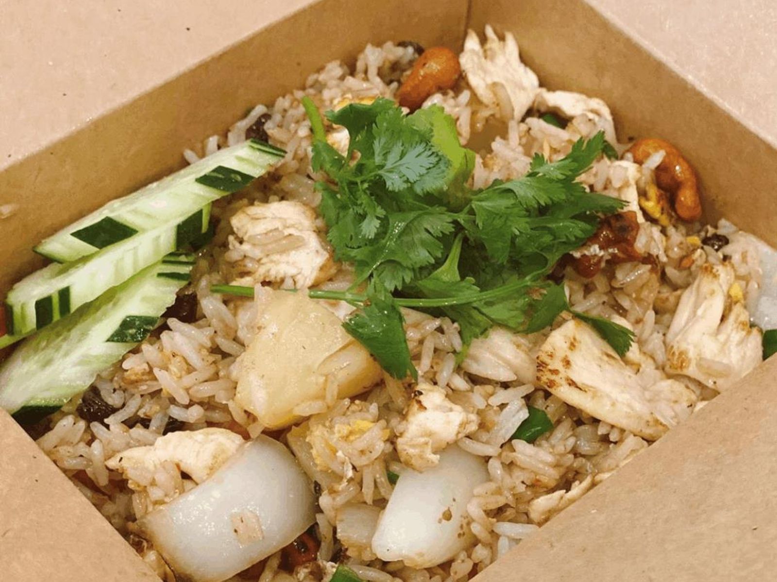 Order Pineapple Fried Rice food online from I am Thai Eatery store, Vancouver on bringmethat.com