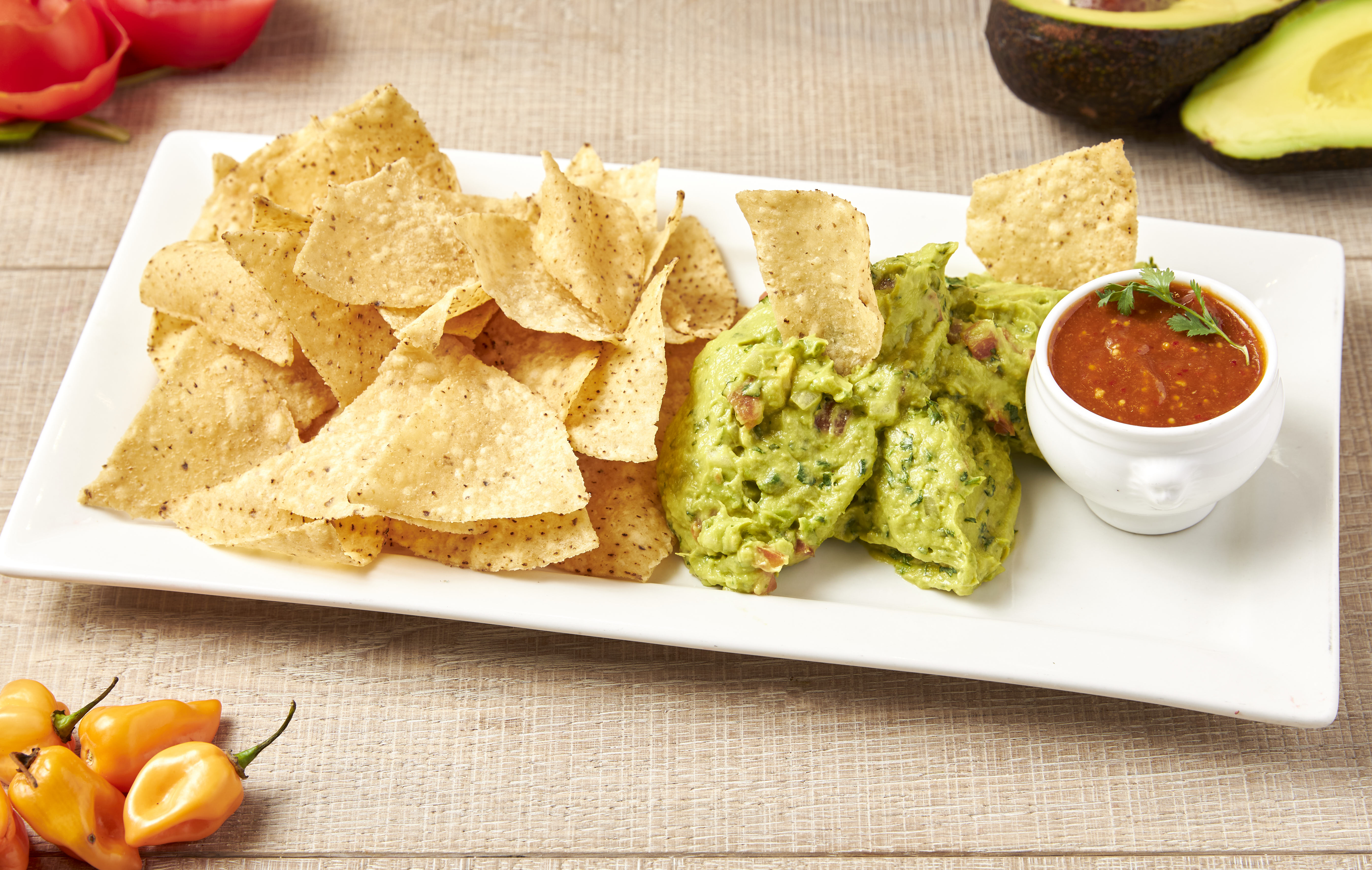 Order Guacamole and Salsa with Freshly Made Tortilla Chips food online from Market Creations store, Chicago on bringmethat.com