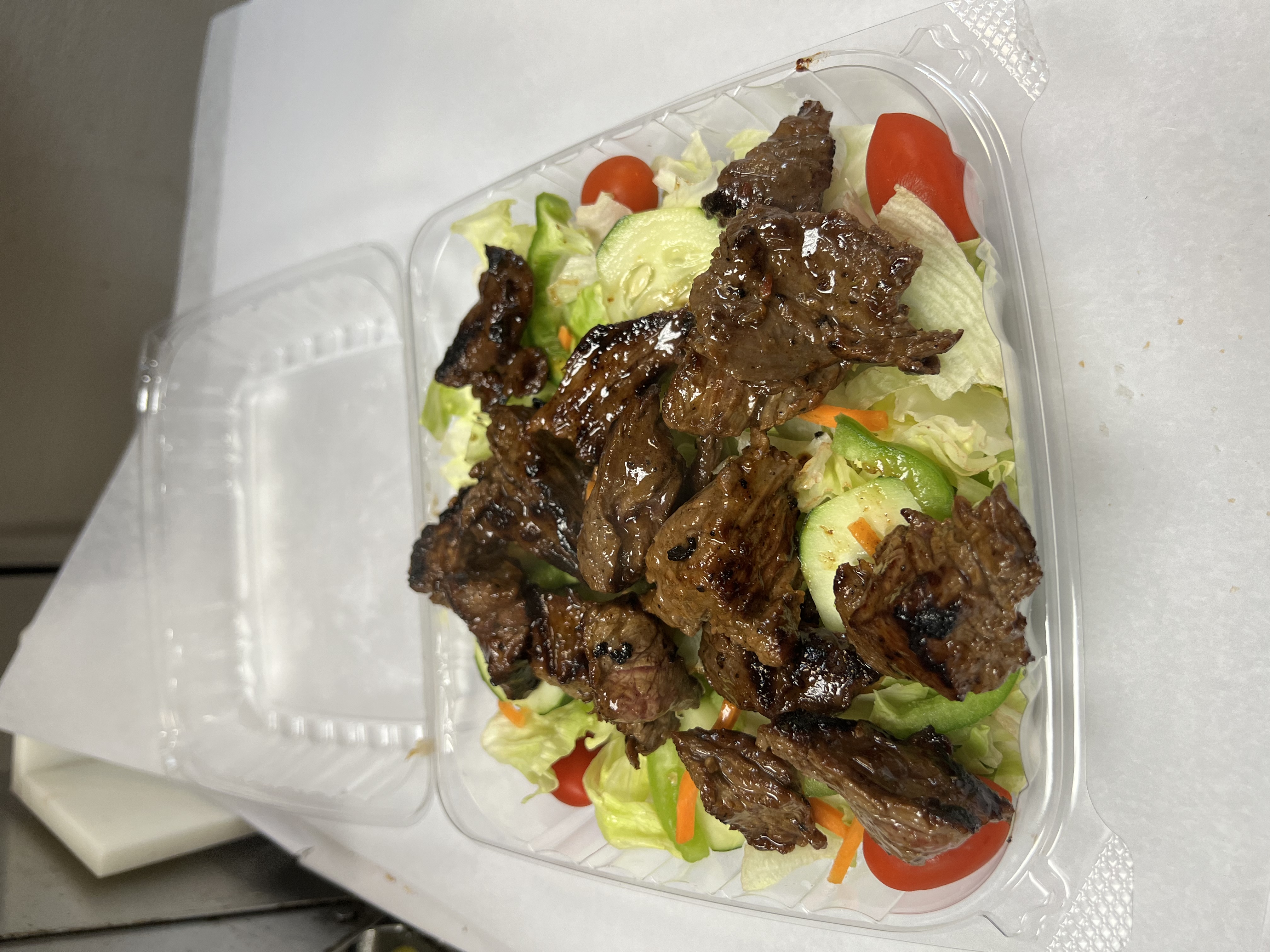 Order Steak Tip Salad food online from Luisa's Italian Pizzeria store, Manchester on bringmethat.com