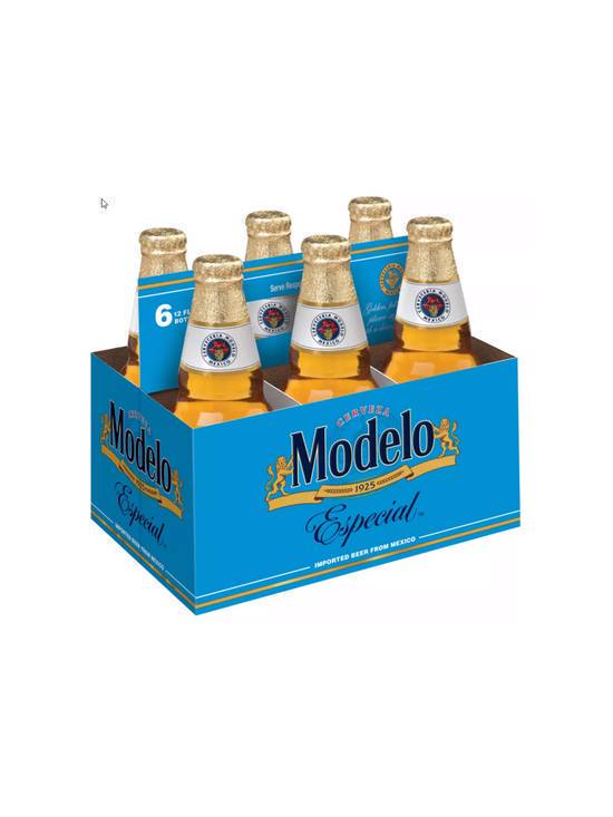 Order Modelo 6pk 12 OZ Bottle (4.4 % ABV) food online from Chevron Extramile store, Gilroy on bringmethat.com