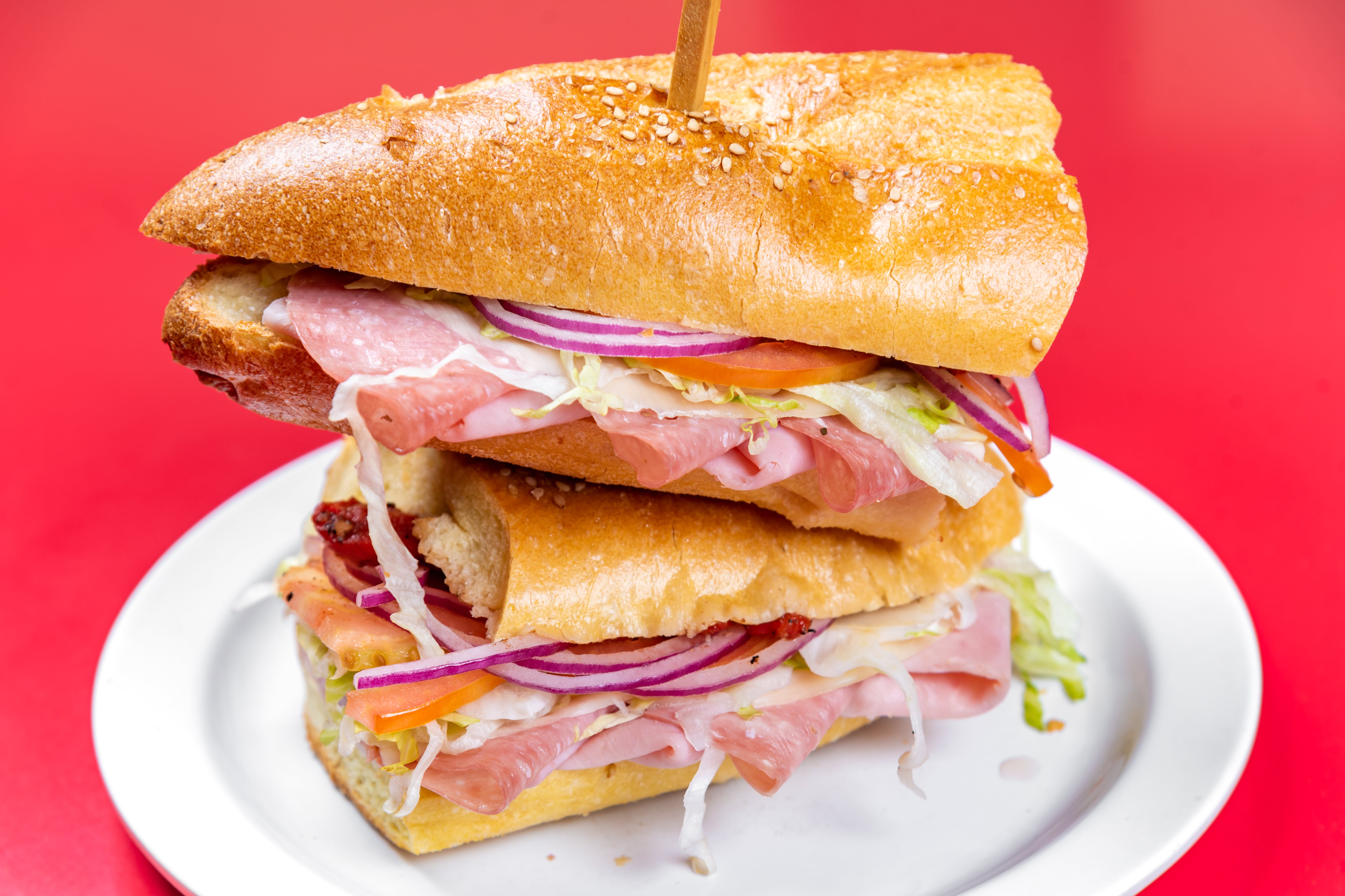 Order Torpedo Sandwich - Sandwich food online from The Grotto Pizzeria store, New York on bringmethat.com
