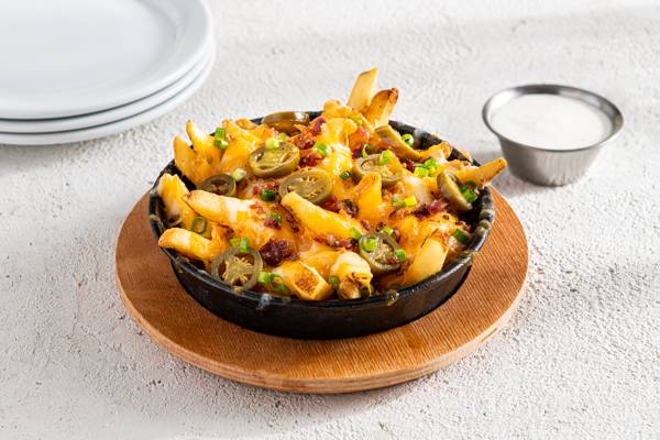Order Texas Cheese Fries - Half food online from Chili's Grill & Bar store, Flint on bringmethat.com
