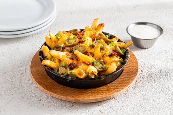 Order Texas Cheese Fries - Half food online from Chilis store, Noblesville on bringmethat.com