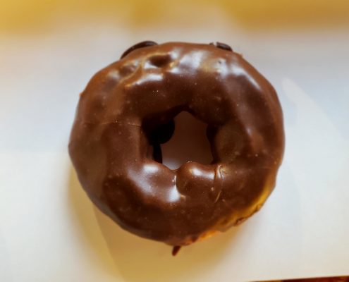 Order Glazed Chocolate Donut food online from T-Town Daylight Donuts store, Tulsa on bringmethat.com