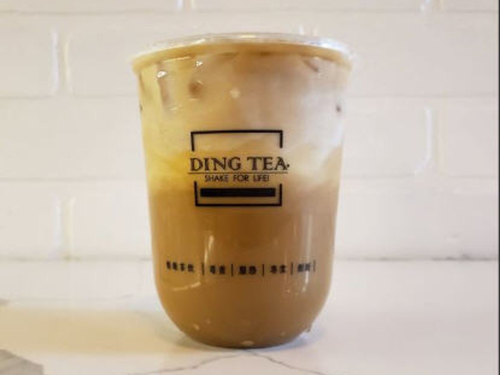 Order Condensed Milk Coffee Latte food online from Ding Tea Carson store, Carson on bringmethat.com