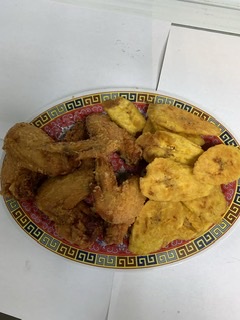 Order Fried Chicken wings with green plantain food online from Jamaica fish market store, Richmond Hill on bringmethat.com