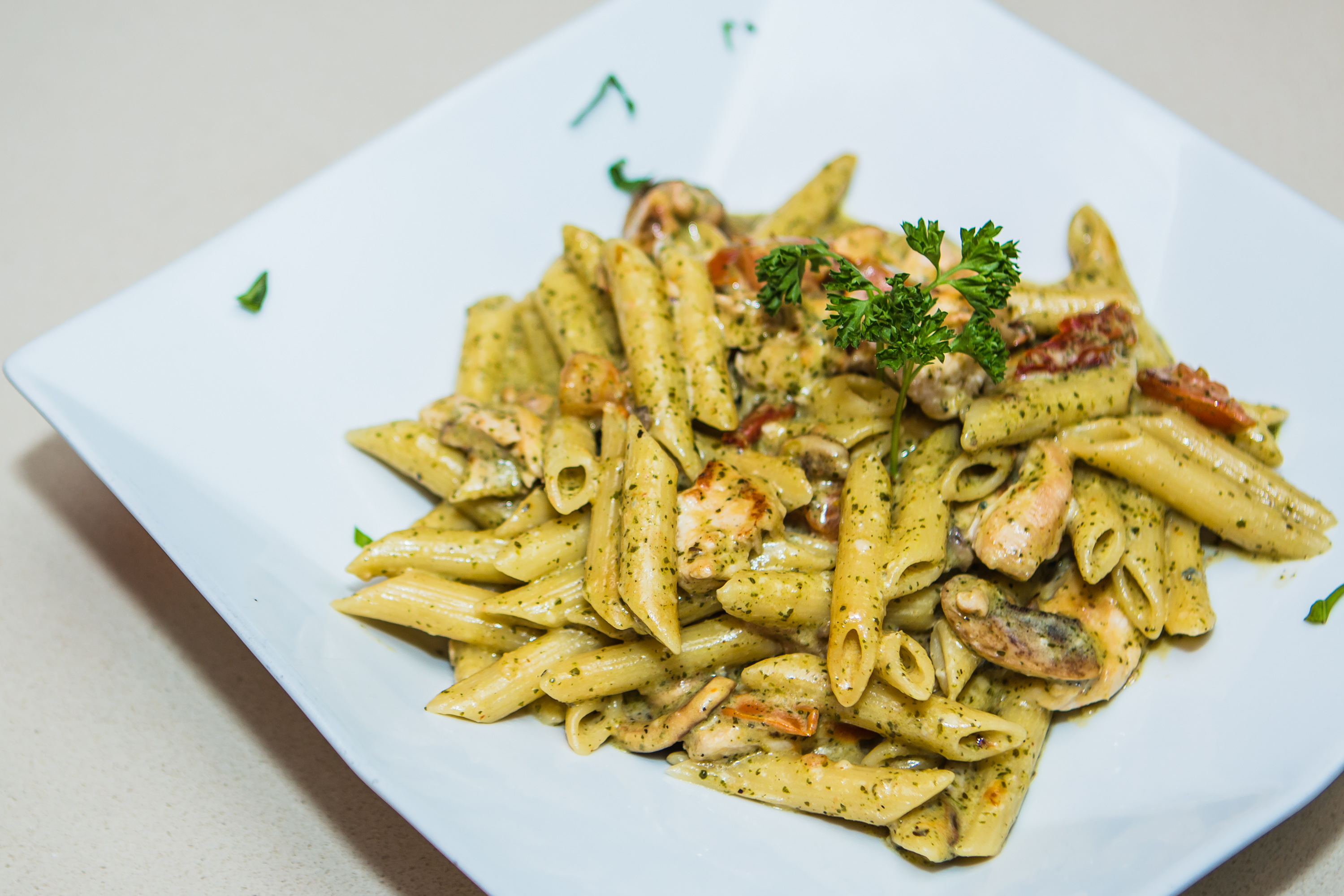 Order Pesto Gorgonzola Penne food online from Panini Pizza & Italian Kitchen store, West Hollywood on bringmethat.com