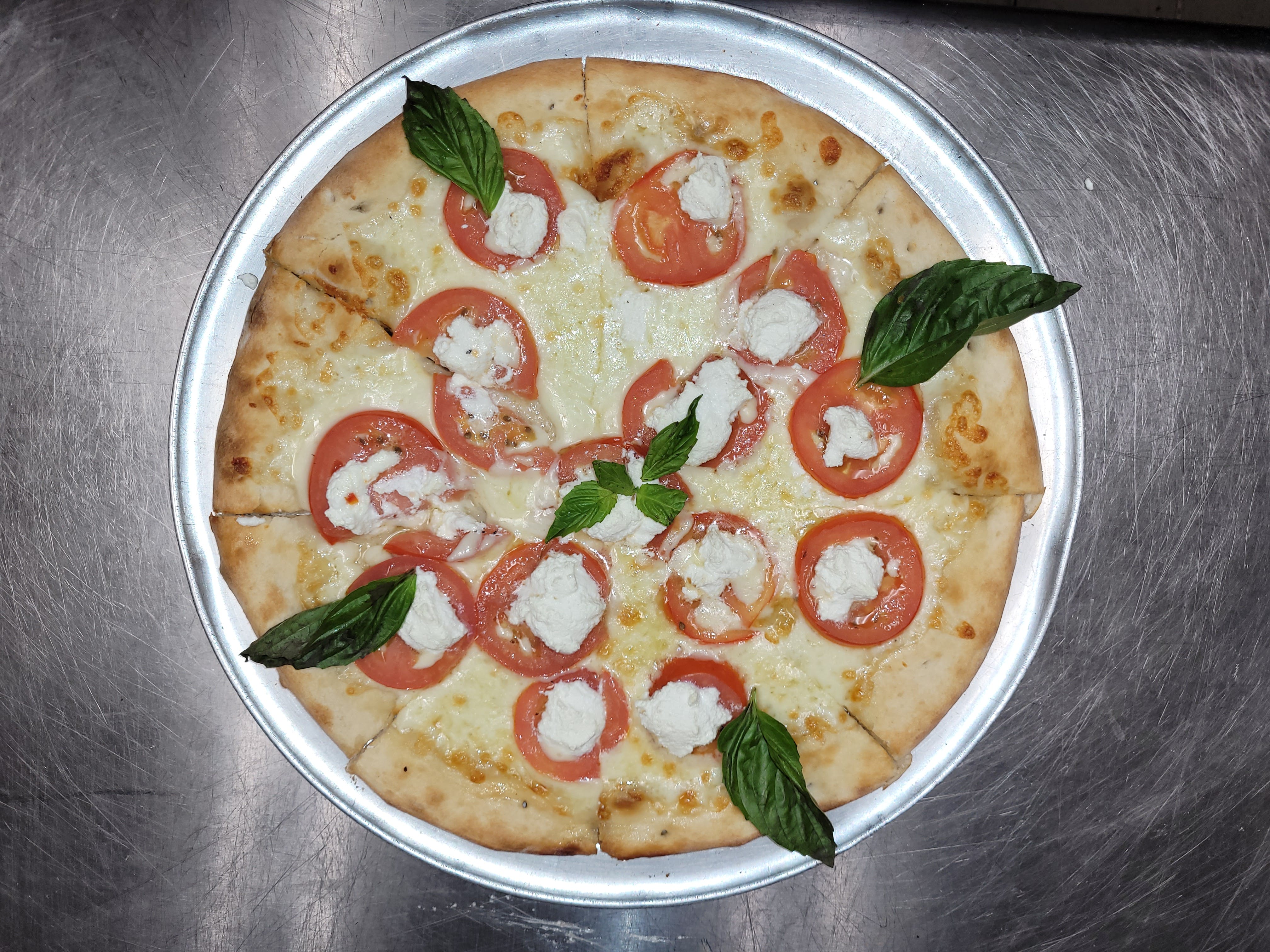 Order Margherita Pizza - 12'' food online from Mony Pizzeria store, Houston on bringmethat.com
