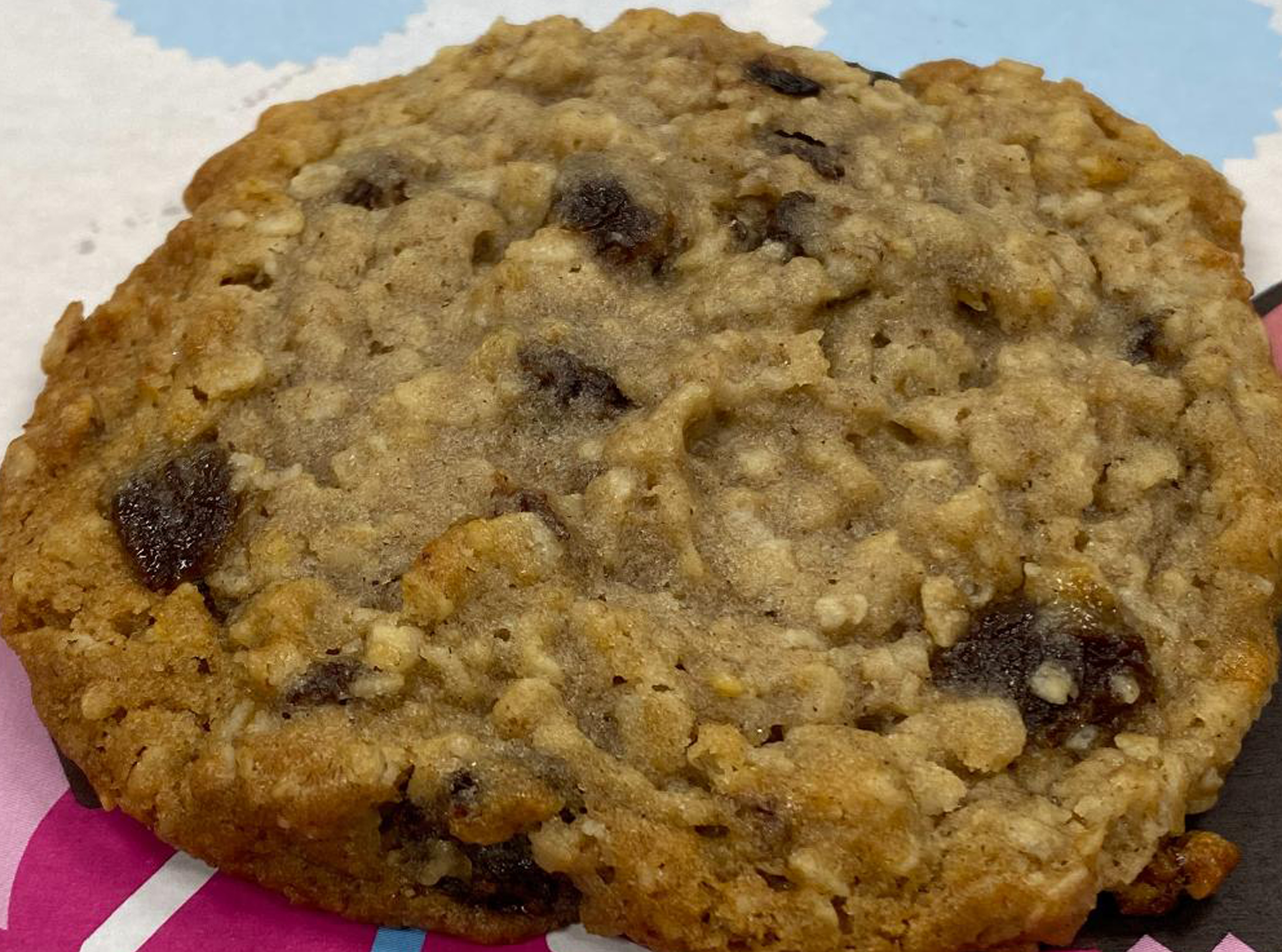 Order Just Baked Oatmeal Raisin Cookie food online from Tubbys Sub Shop & Just Baked Cupcakes store, Wixom on bringmethat.com