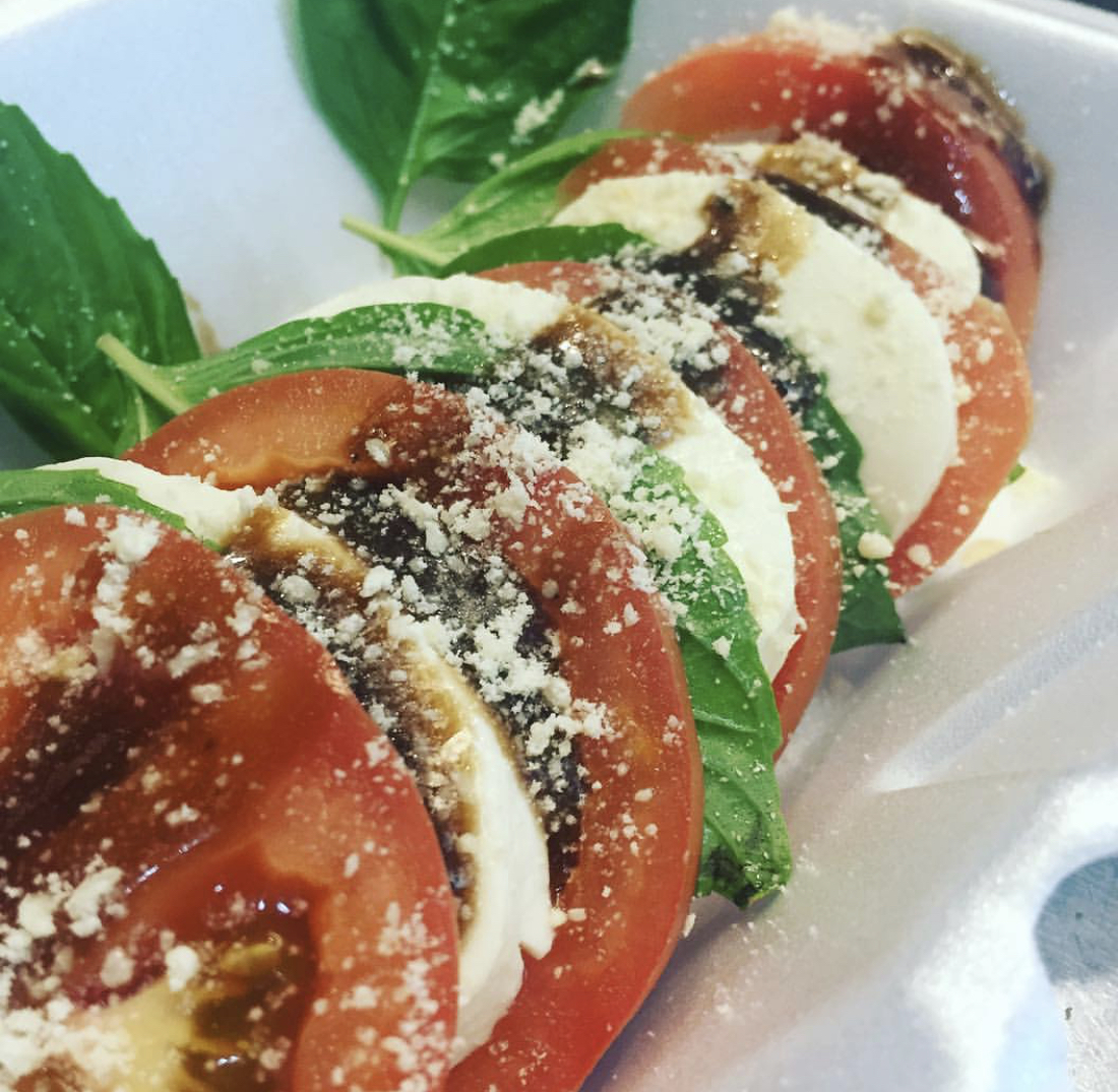 Order Caprese Salad food online from Golden Crust Pizza store, Providence on bringmethat.com