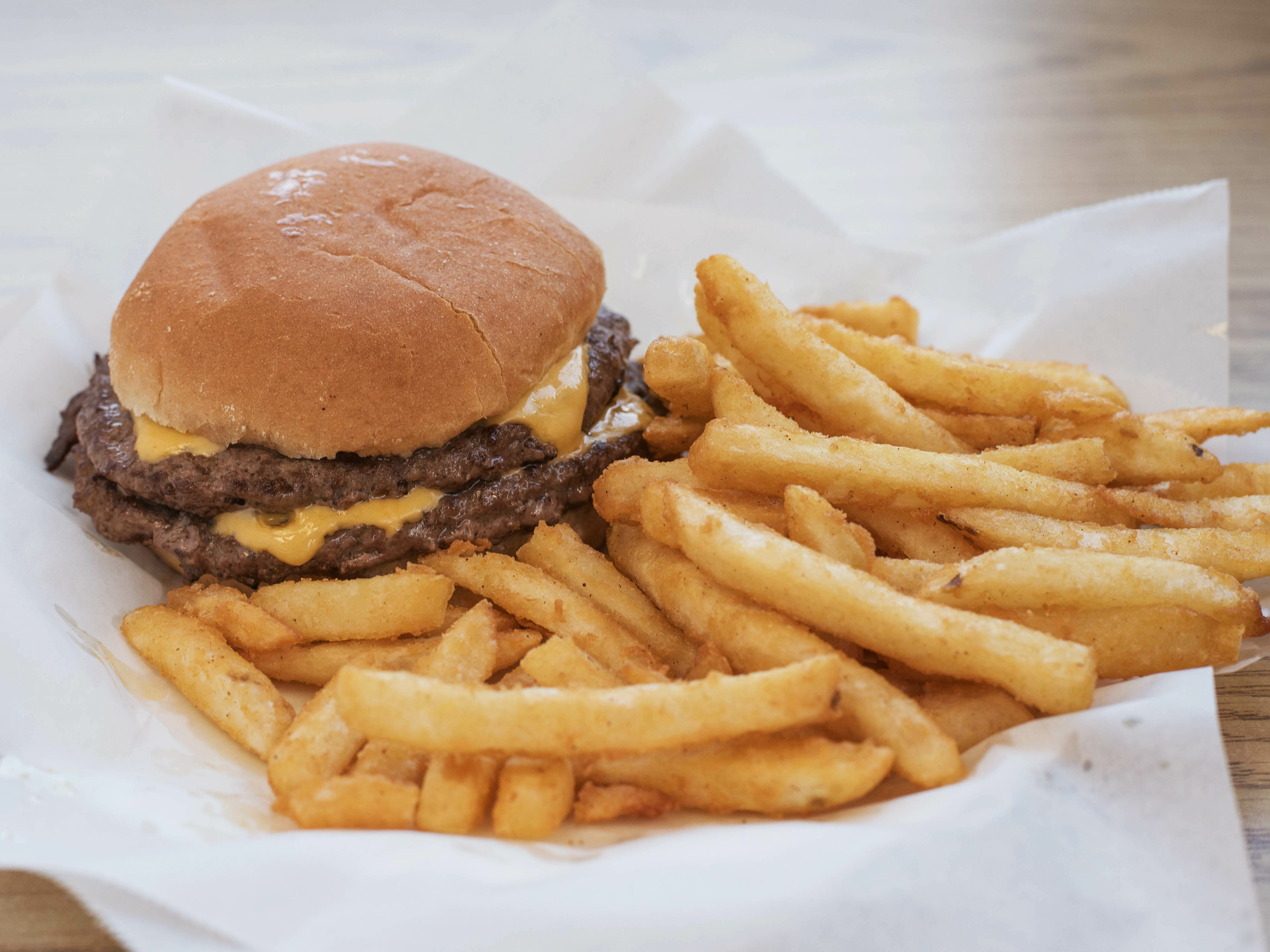 Order 1/3 lb. Double Cheeseburger food online from Jiff-e-Mart I store, Averill Park on bringmethat.com