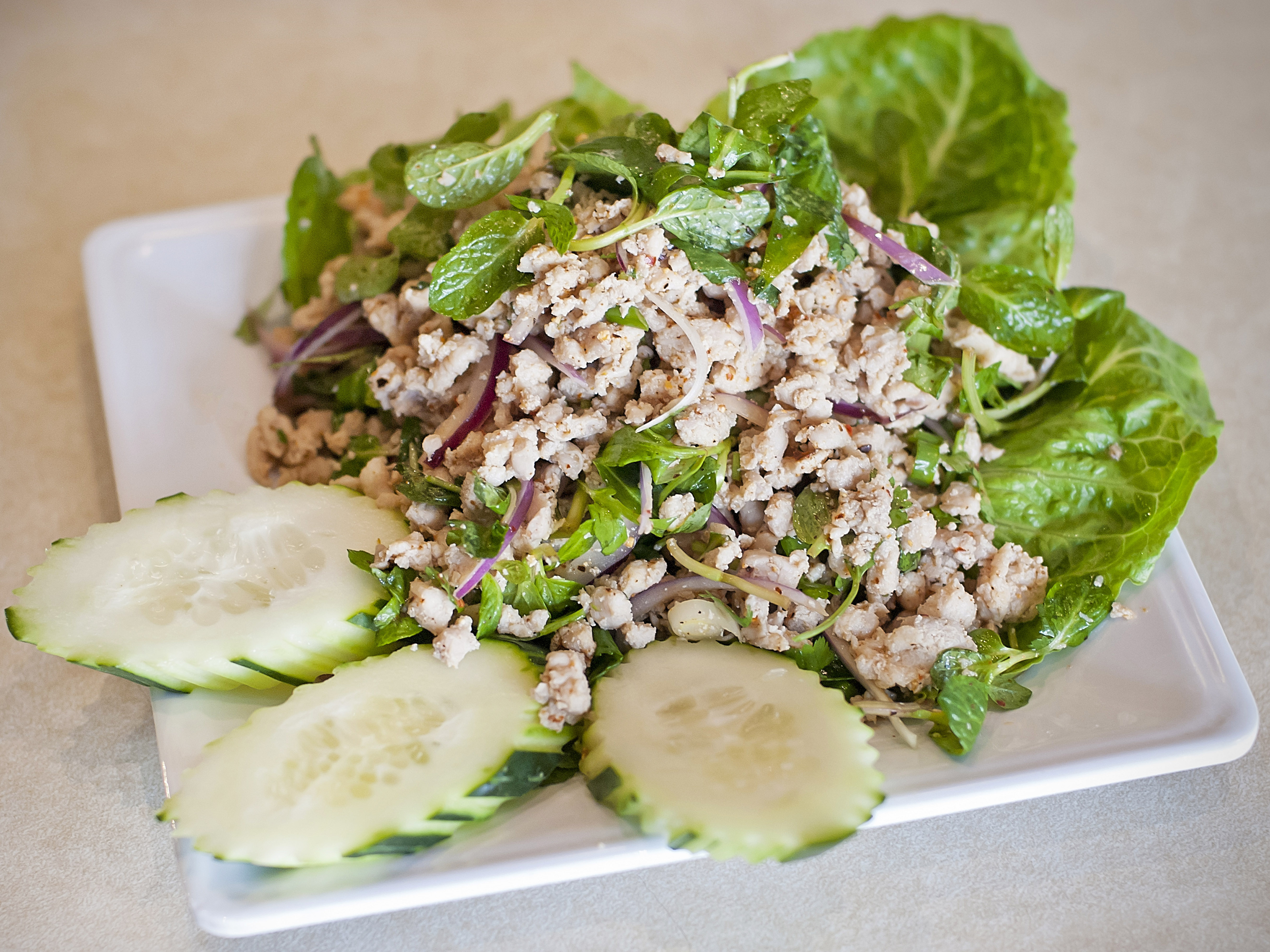 Order 17. Larp Salad food online from Champa Garden store, Oakland on bringmethat.com