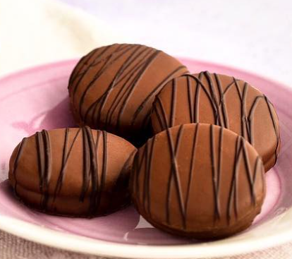 Order 3 Chocolate Dipped Oreos food online from Rocky Mountain Chocolate Factory -Broomfield store, Broomfield on bringmethat.com
