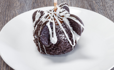 Order Cookies and Cream Apple food online from Rocky Mountain Chocolate Factory store, Terrell on bringmethat.com