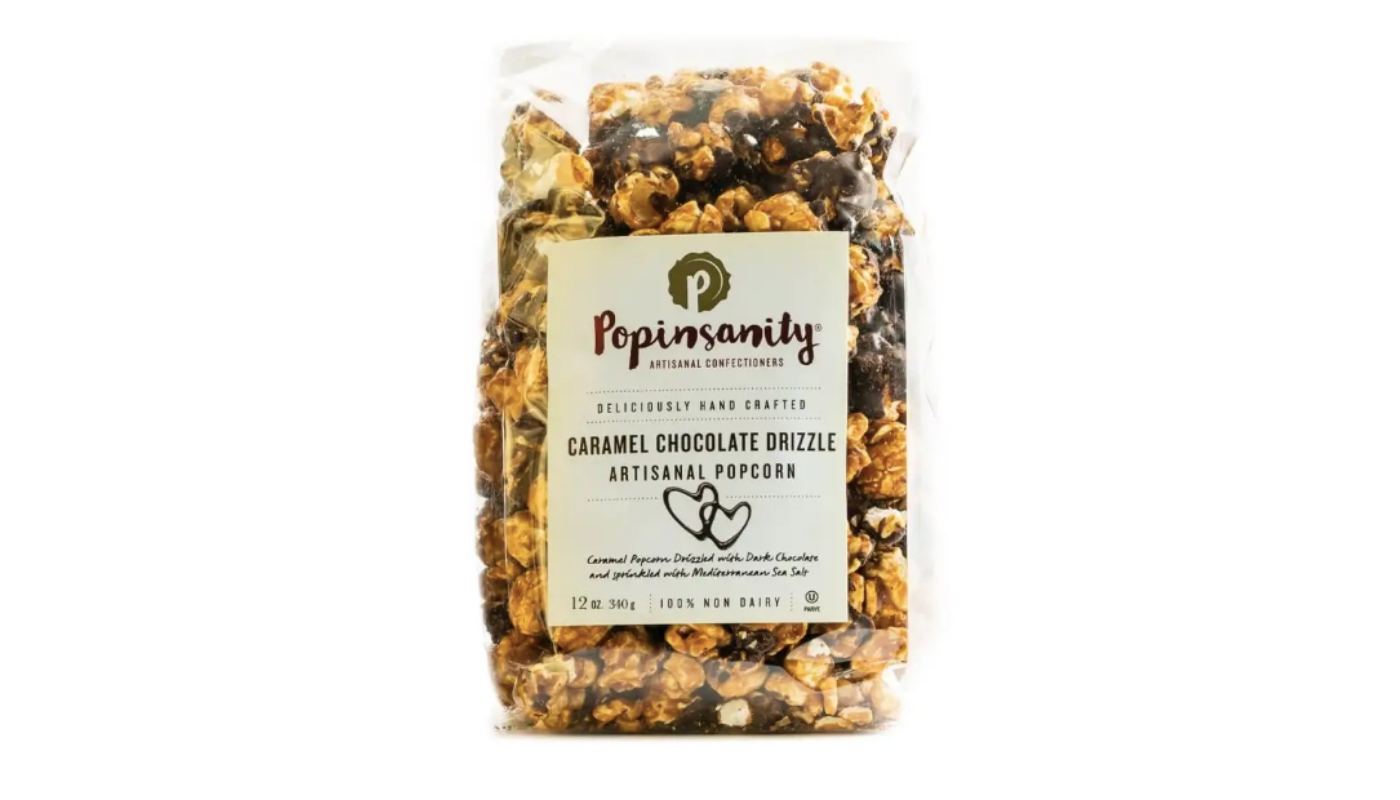 Order Popinsanity Gourmet Popcorn Caramel Chocolate Drizzle (340grs Large Bag) food online from Fine Chocolate Club store, San Francisco on bringmethat.com