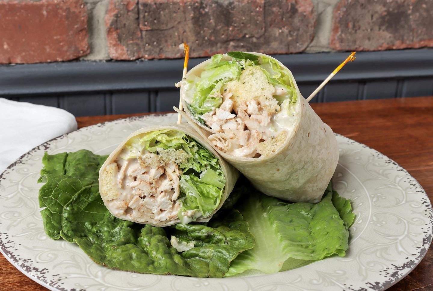 Order Grilled Chicken Caesar Wrap - Wrap food online from Pat D Pizza store, Howell Township on bringmethat.com