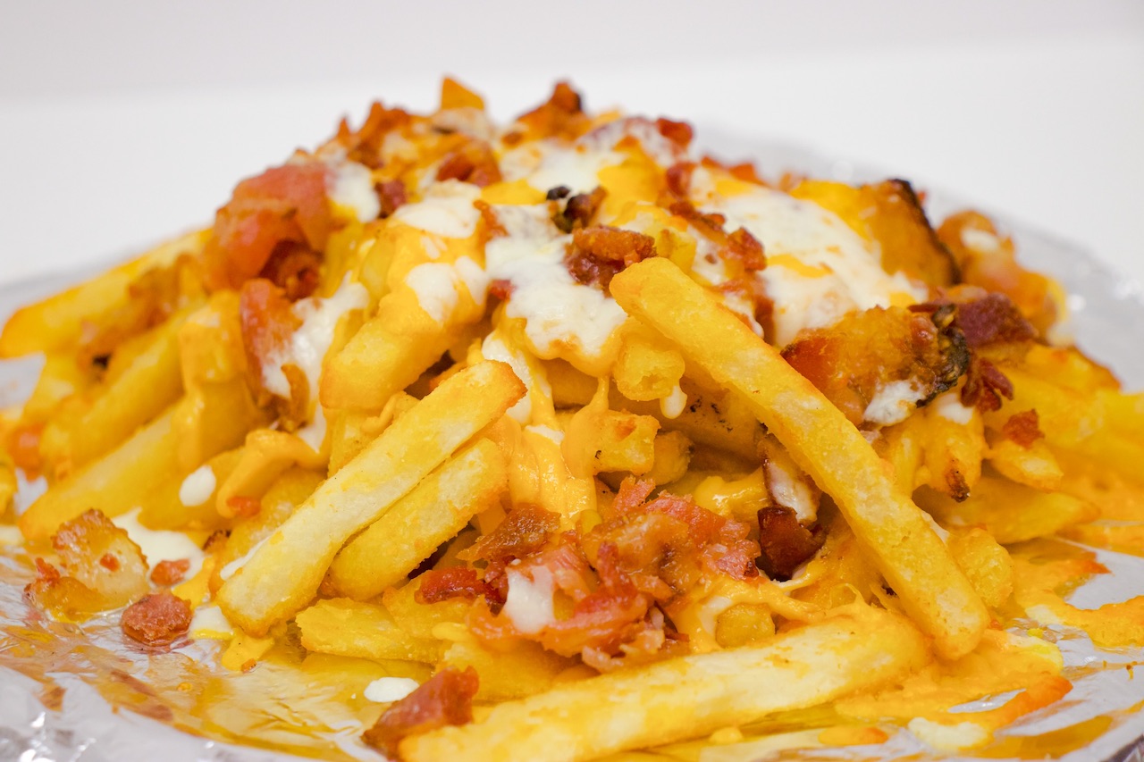 Order Cheddar Bacon Cheese Fries food online from Chanello's Pizza store, Hampton on bringmethat.com
