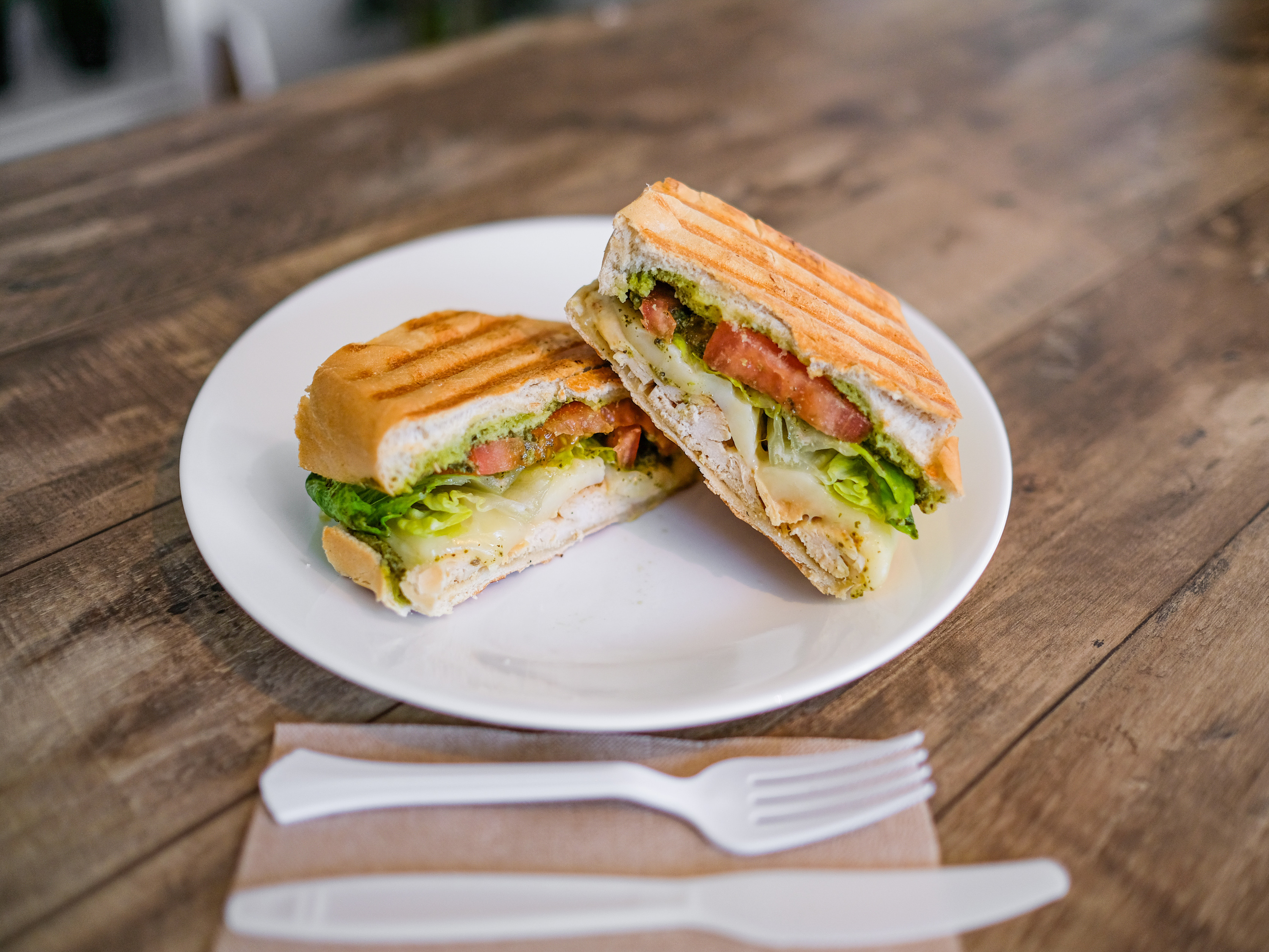 Order Chicken Pesto Panini food online from Ocean Cafe store, San Diego on bringmethat.com