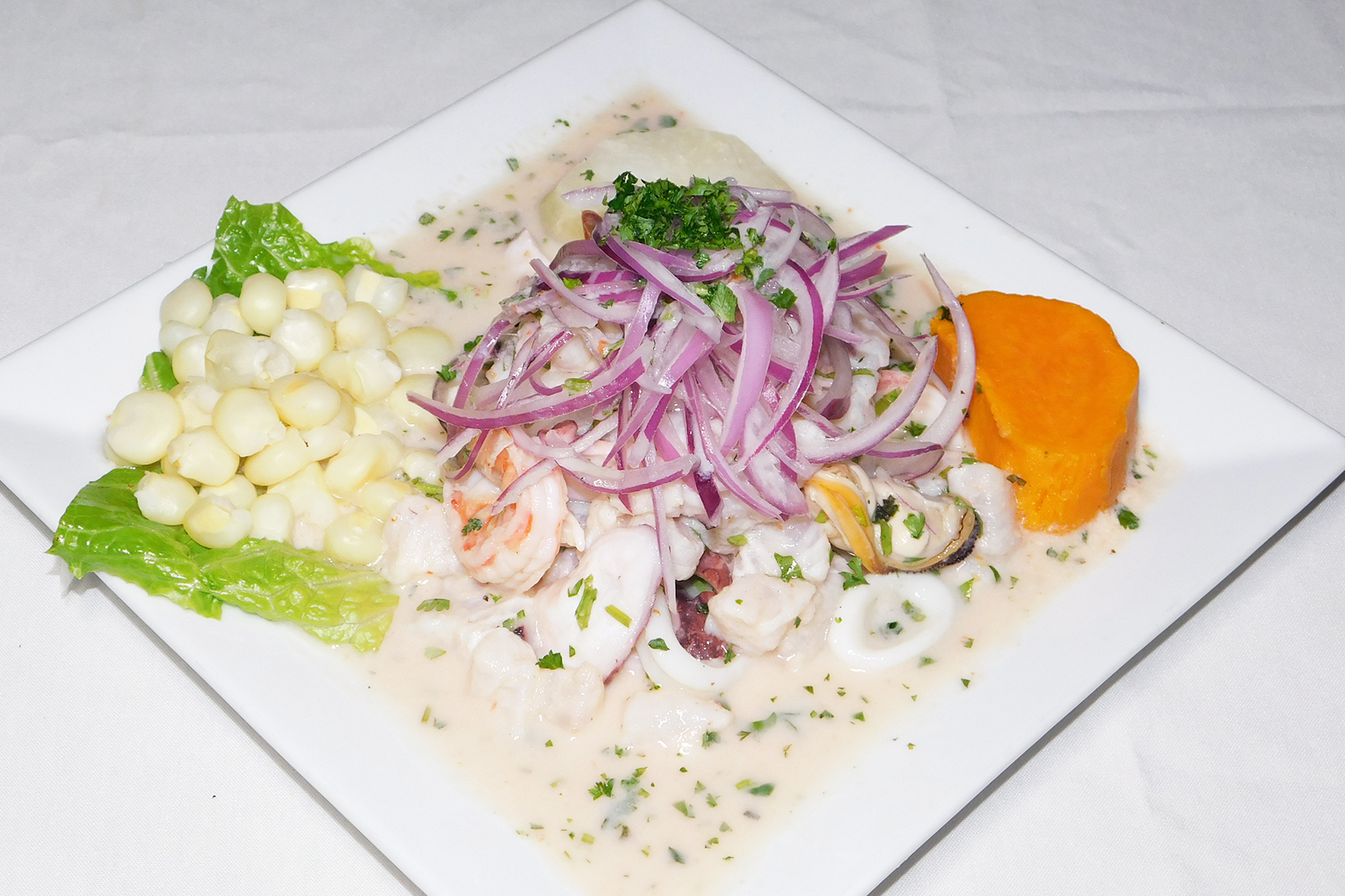 Order Ceviche Mixto food online from Olibar store, New Rochelle on bringmethat.com